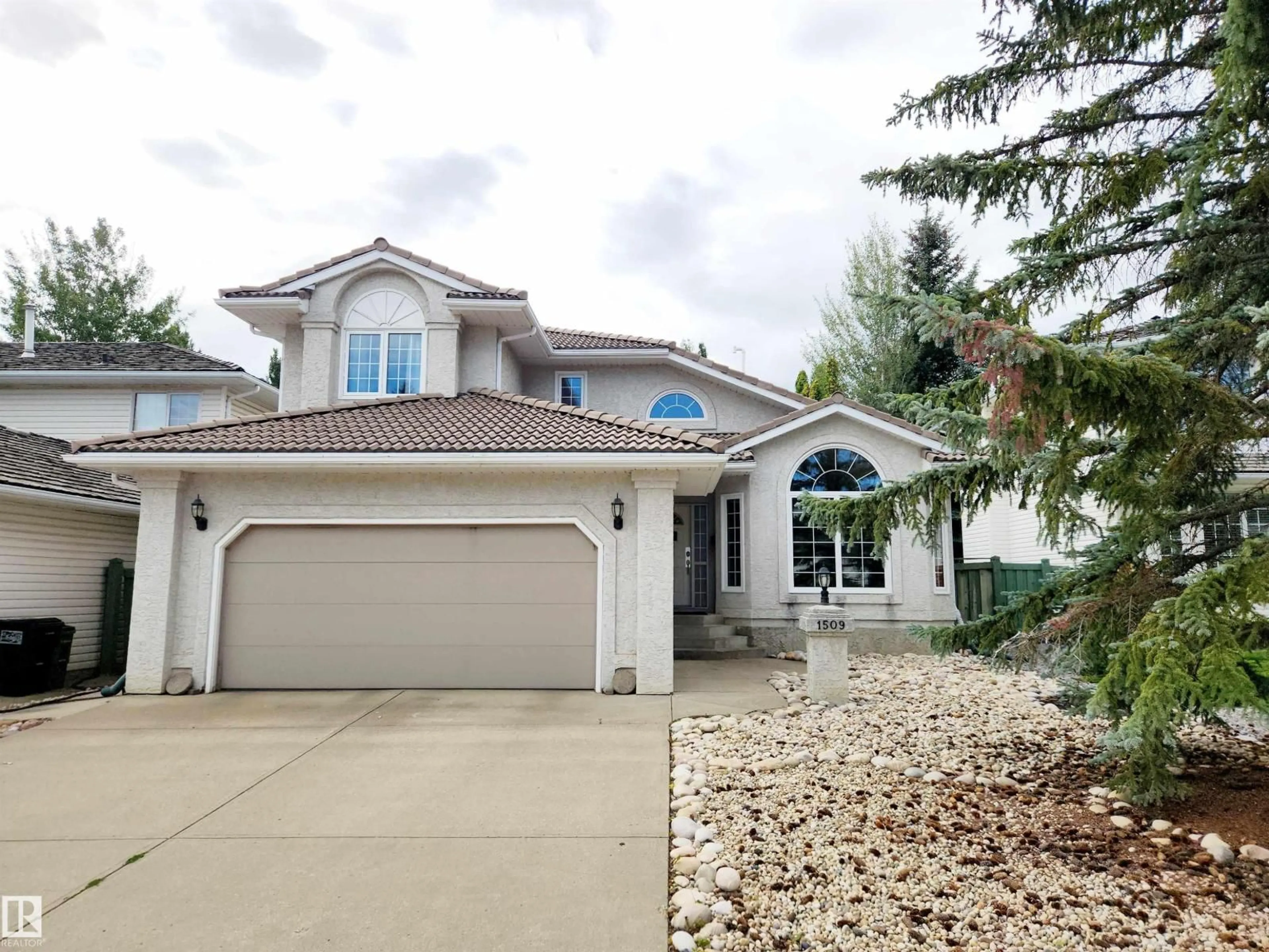 Home with vinyl exterior material, street for 1509 WELLWOOD WY, Edmonton Alberta T6M2M3