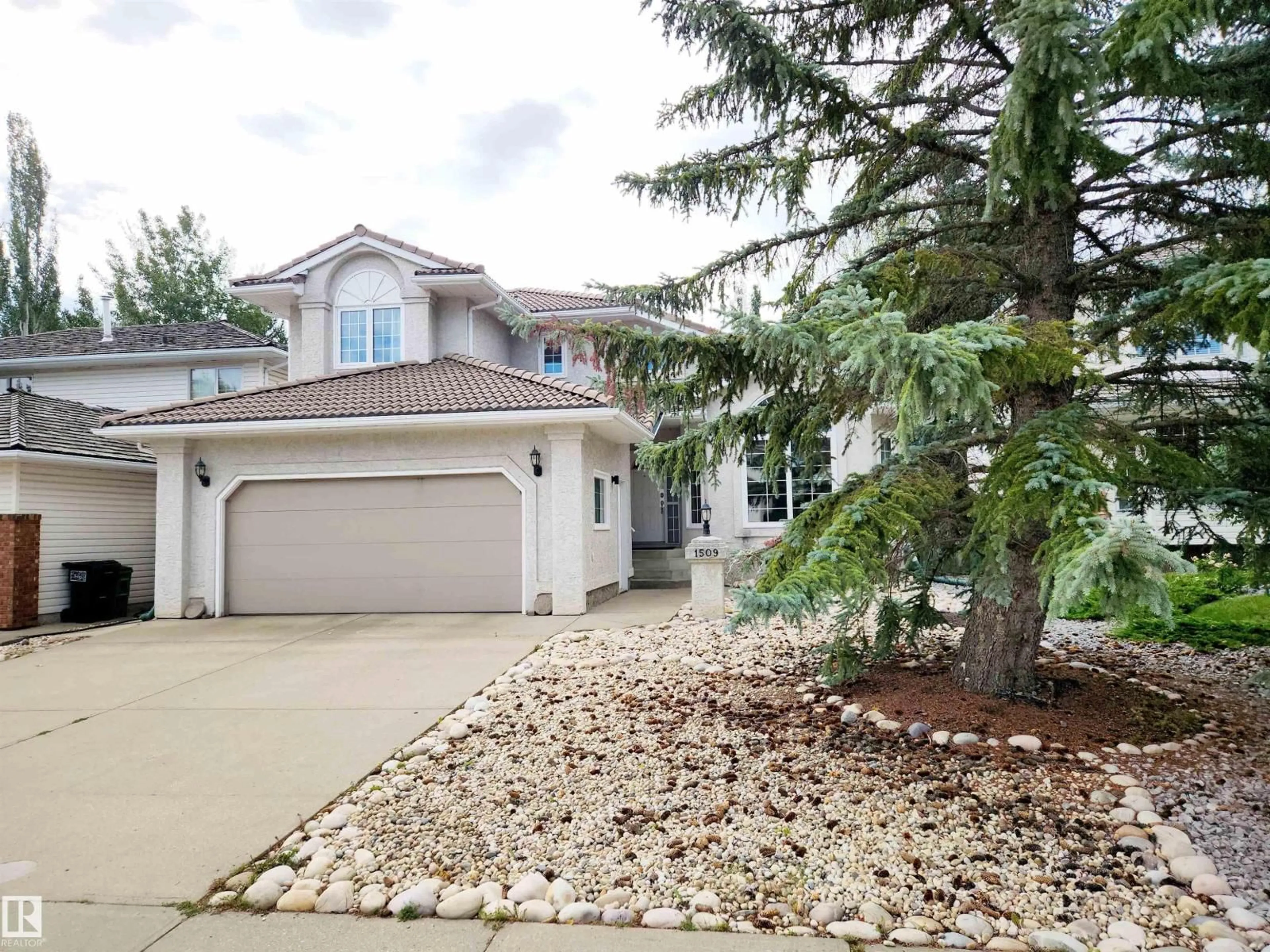 Home with vinyl exterior material, street for 1509 WELLWOOD WY, Edmonton Alberta T6M2M3