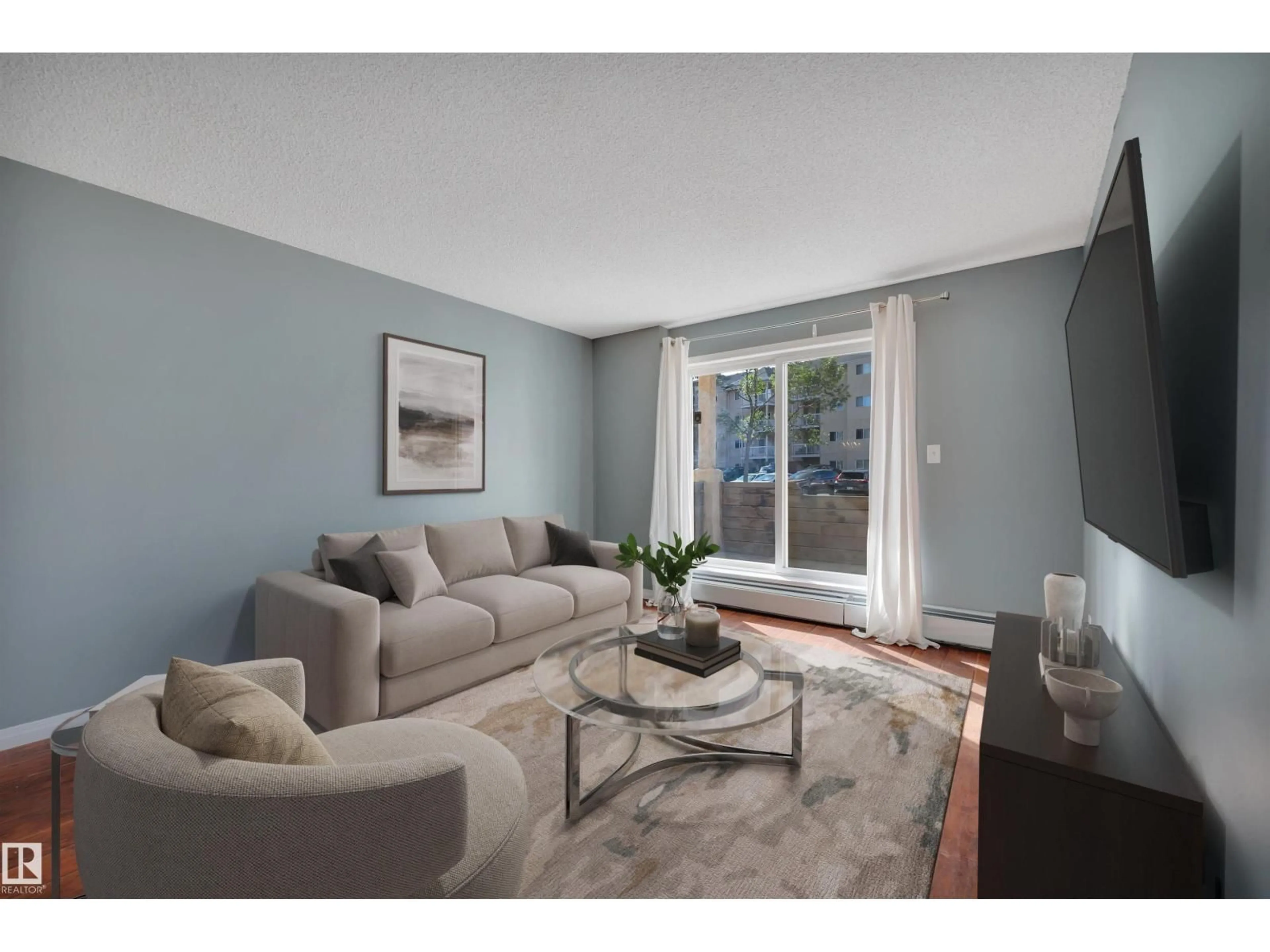 Living room with furniture, unknown for 126 4210 139 AV NW, Edmonton Alberta T5Y2W6