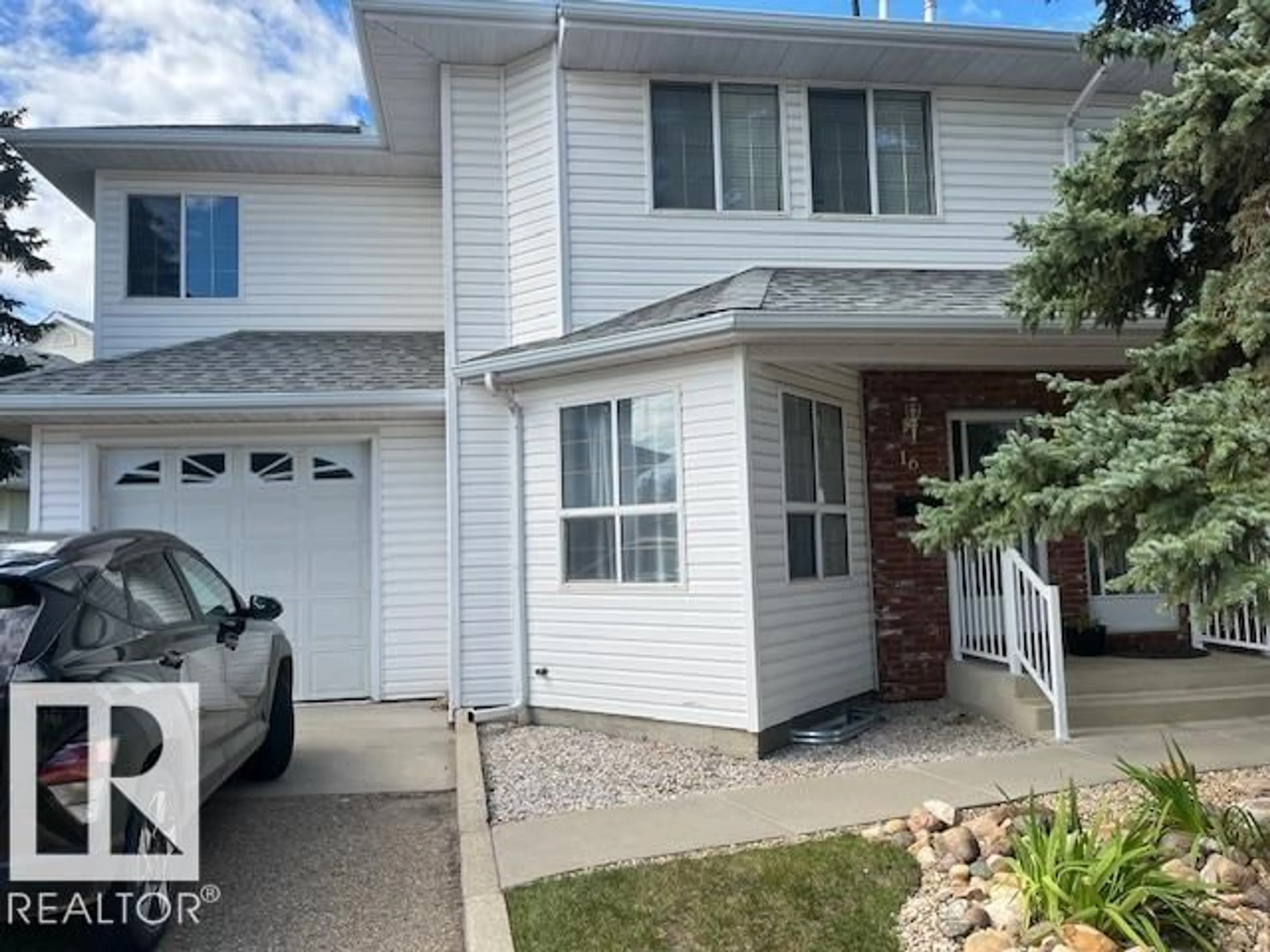Home with vinyl exterior material, street for 1033 - 16 YOUVILLE DR, Edmonton Alberta T6L6V9