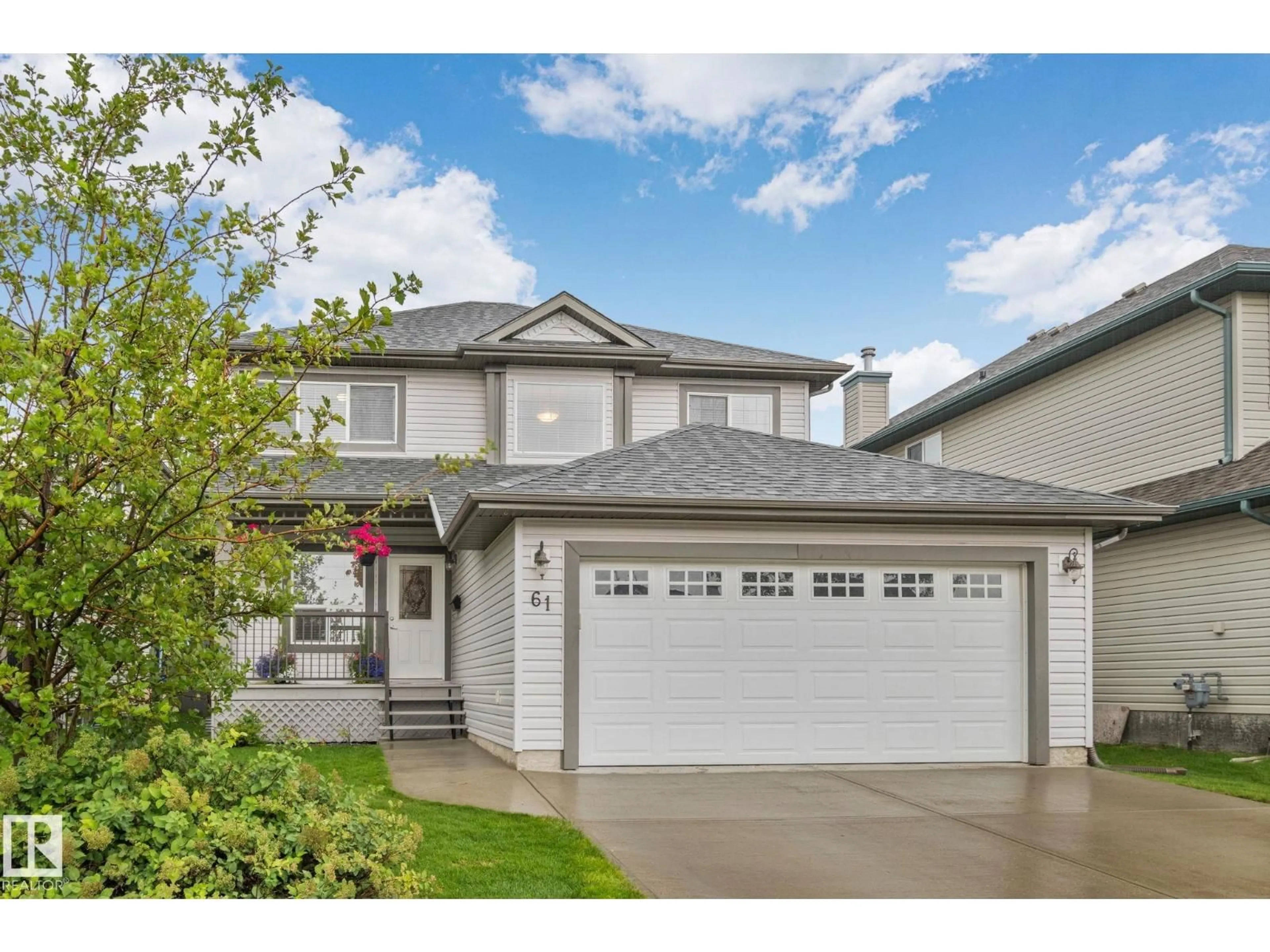 Home with vinyl exterior material, street for 61 RUE MONETTE, Beaumont Alberta T4X1T2