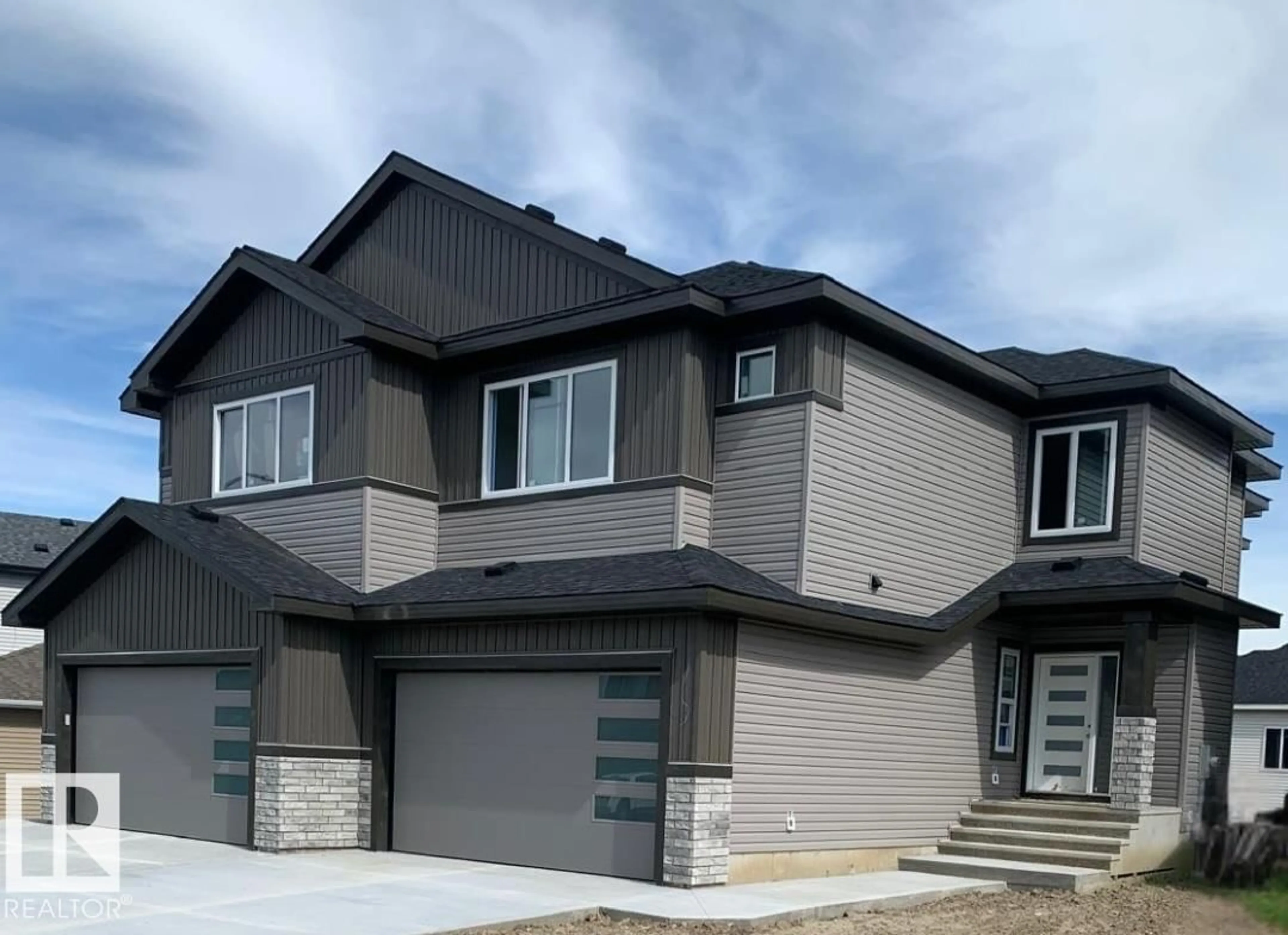 Home with vinyl exterior material, street for 17 HULL WD, Spruce Grove Alberta T7X0X5
