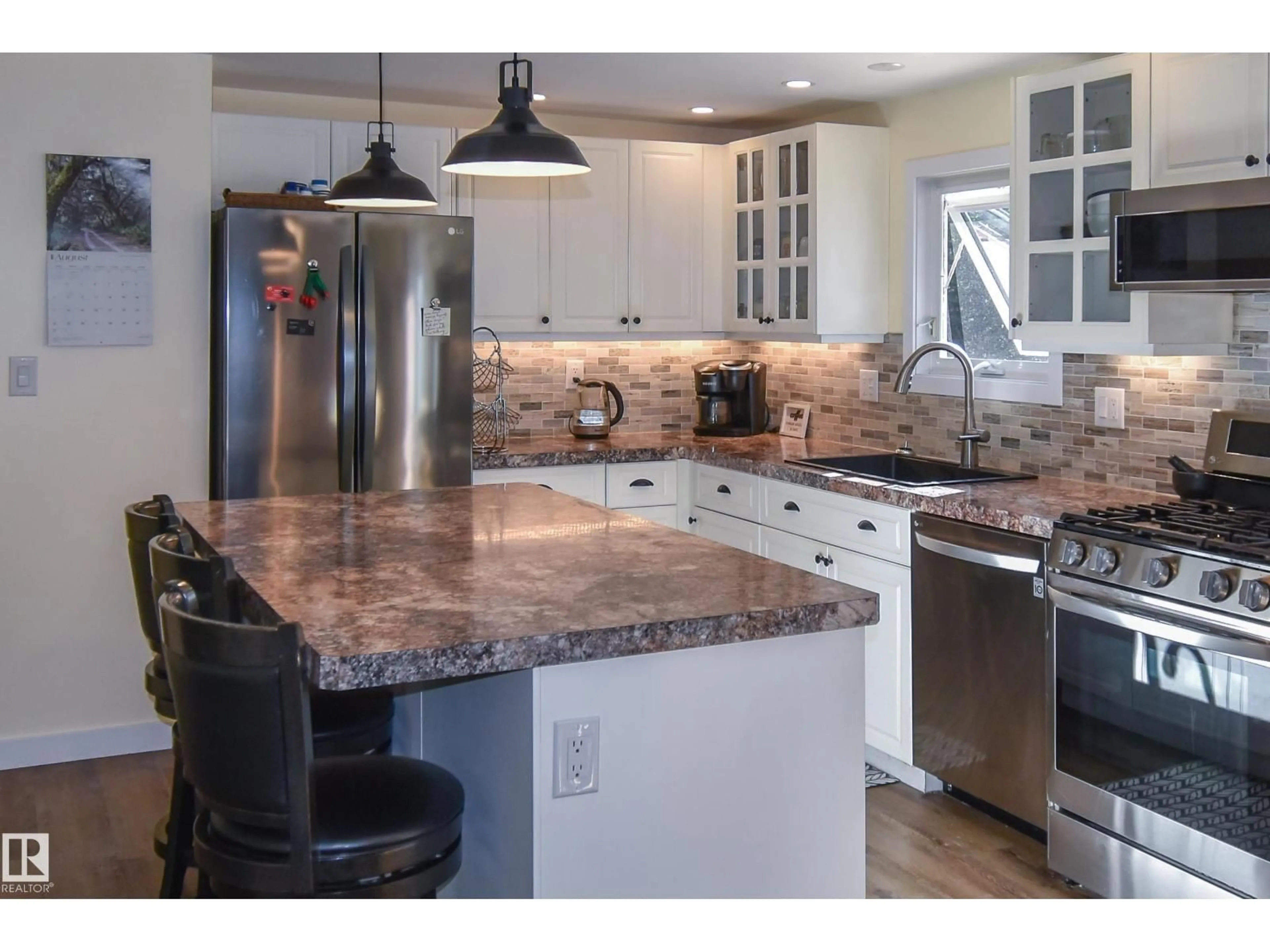 Open concept kitchen, ceramic/tile floor for 307 - 1414 HWY 37, Rural Lac Ste. Anne County Alberta T0E1V0