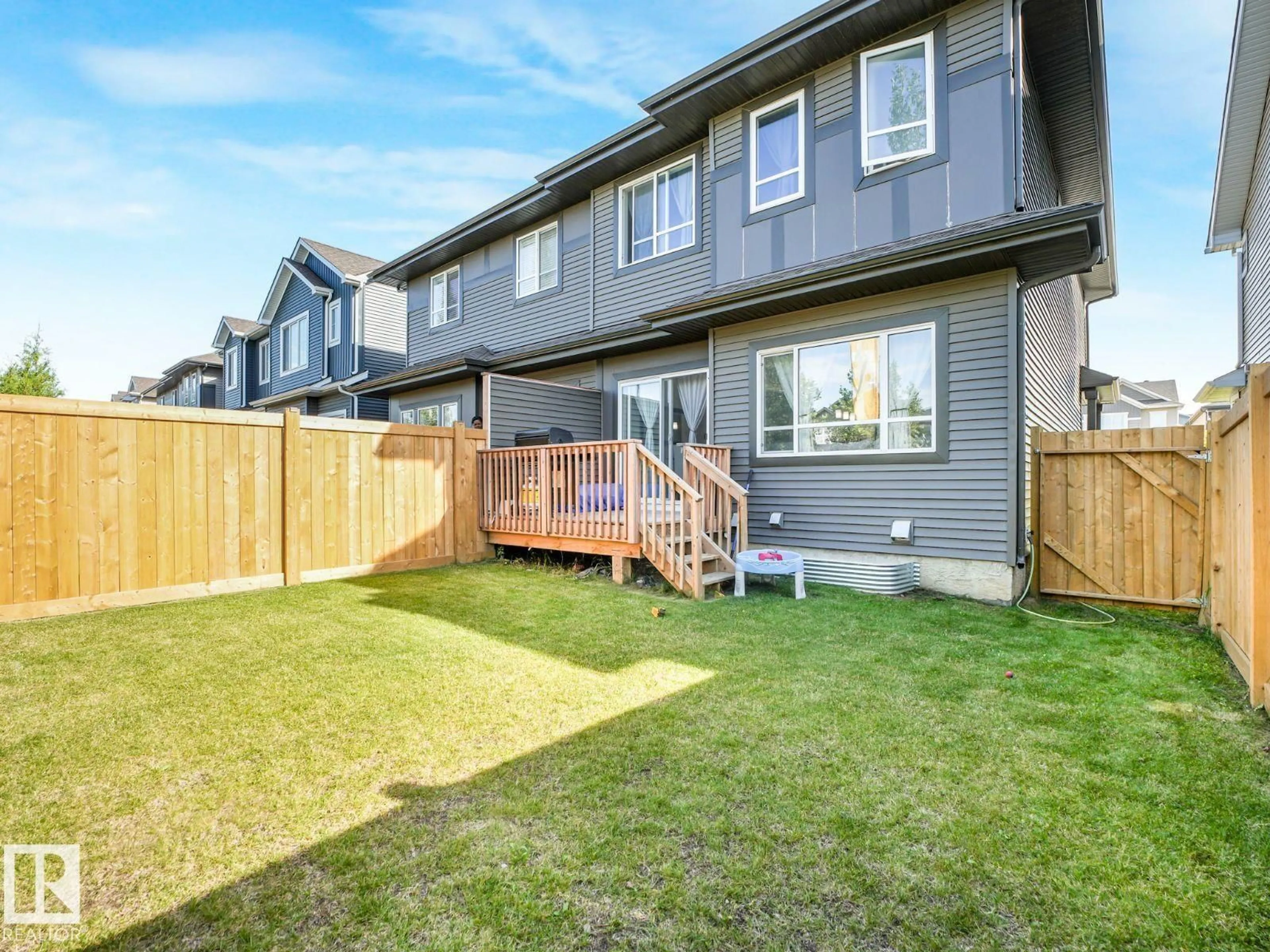 Home with vinyl exterior material, street for 4016 KINSELLA WY, Edmonton Alberta T6W4J5