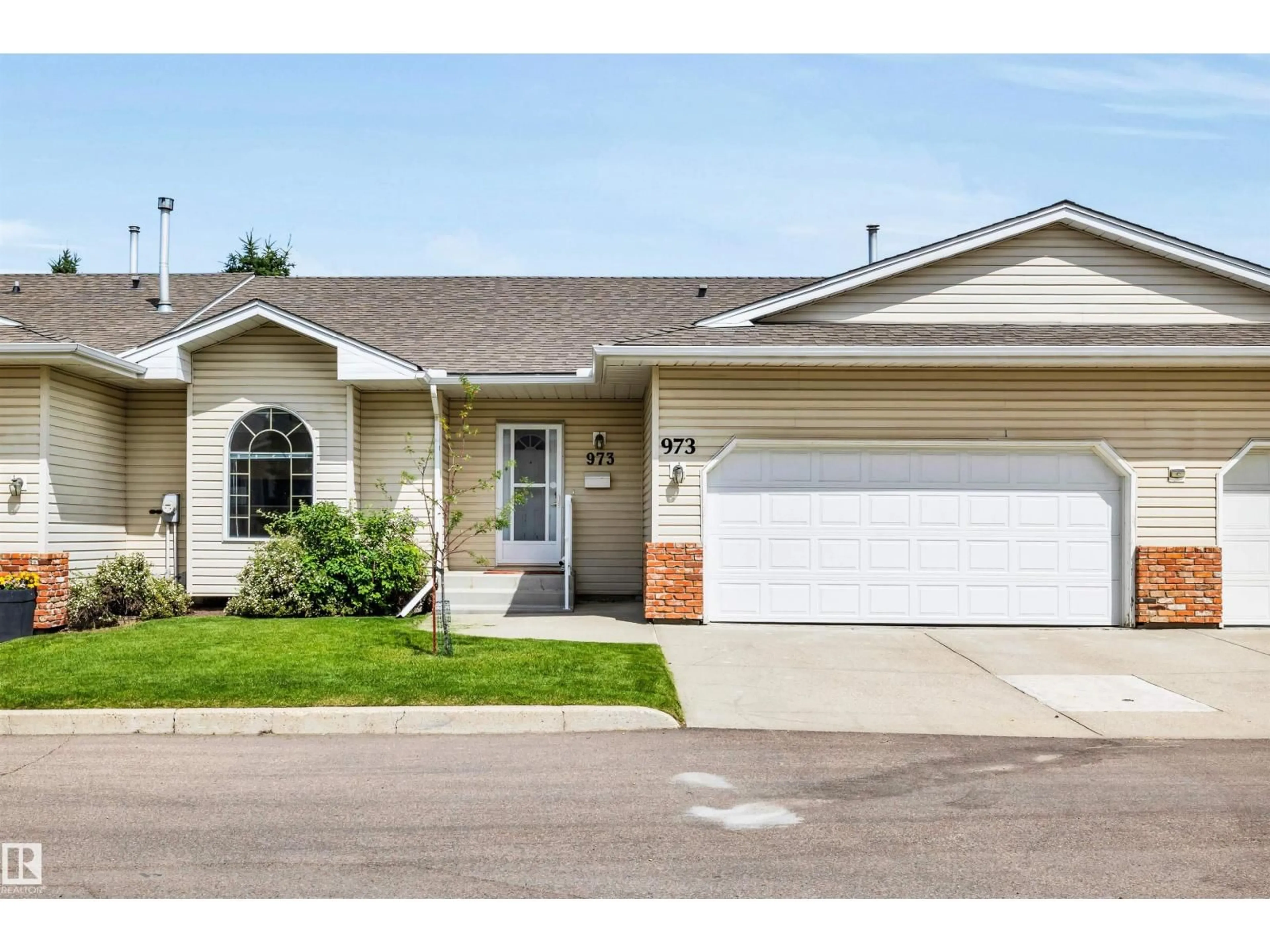 Home with vinyl exterior material, street for 973 YOUVILLE DR, Edmonton Alberta T6L6T2
