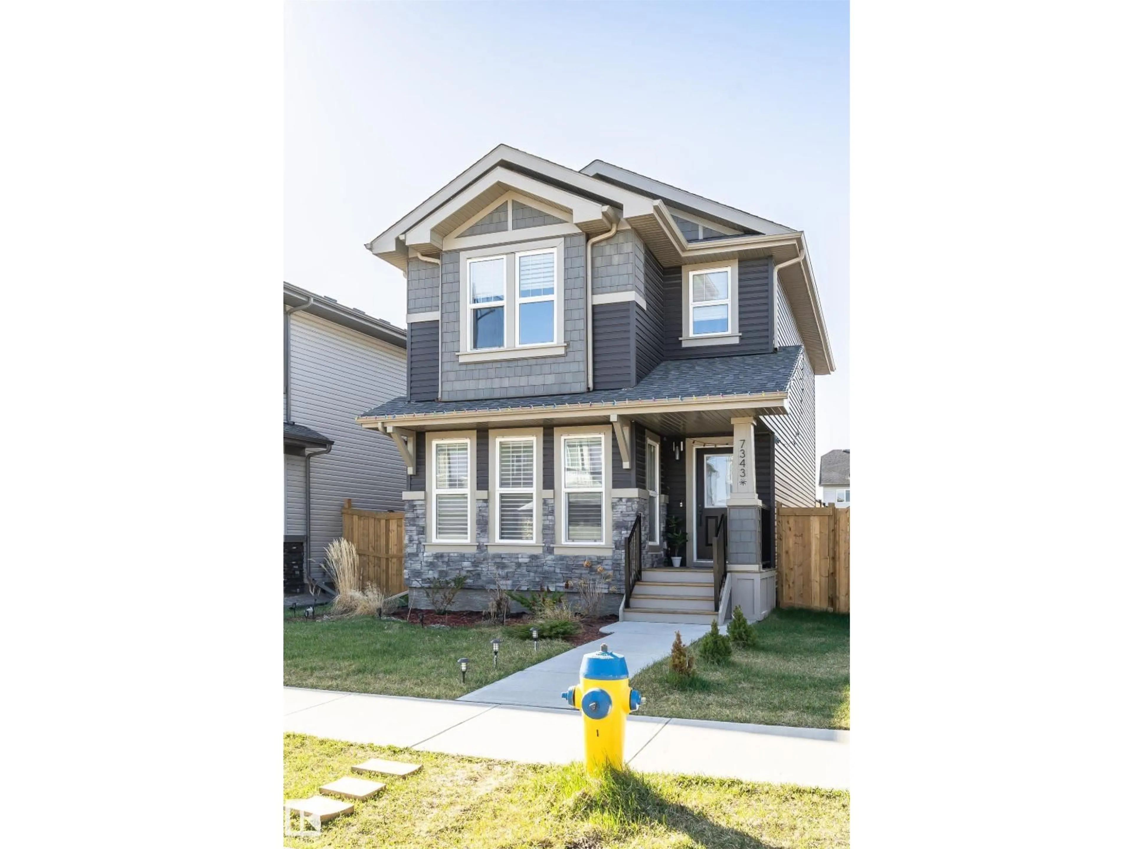 Home with vinyl exterior material, street for NW - 7343 179 AV, Edmonton Alberta T5Z0M7