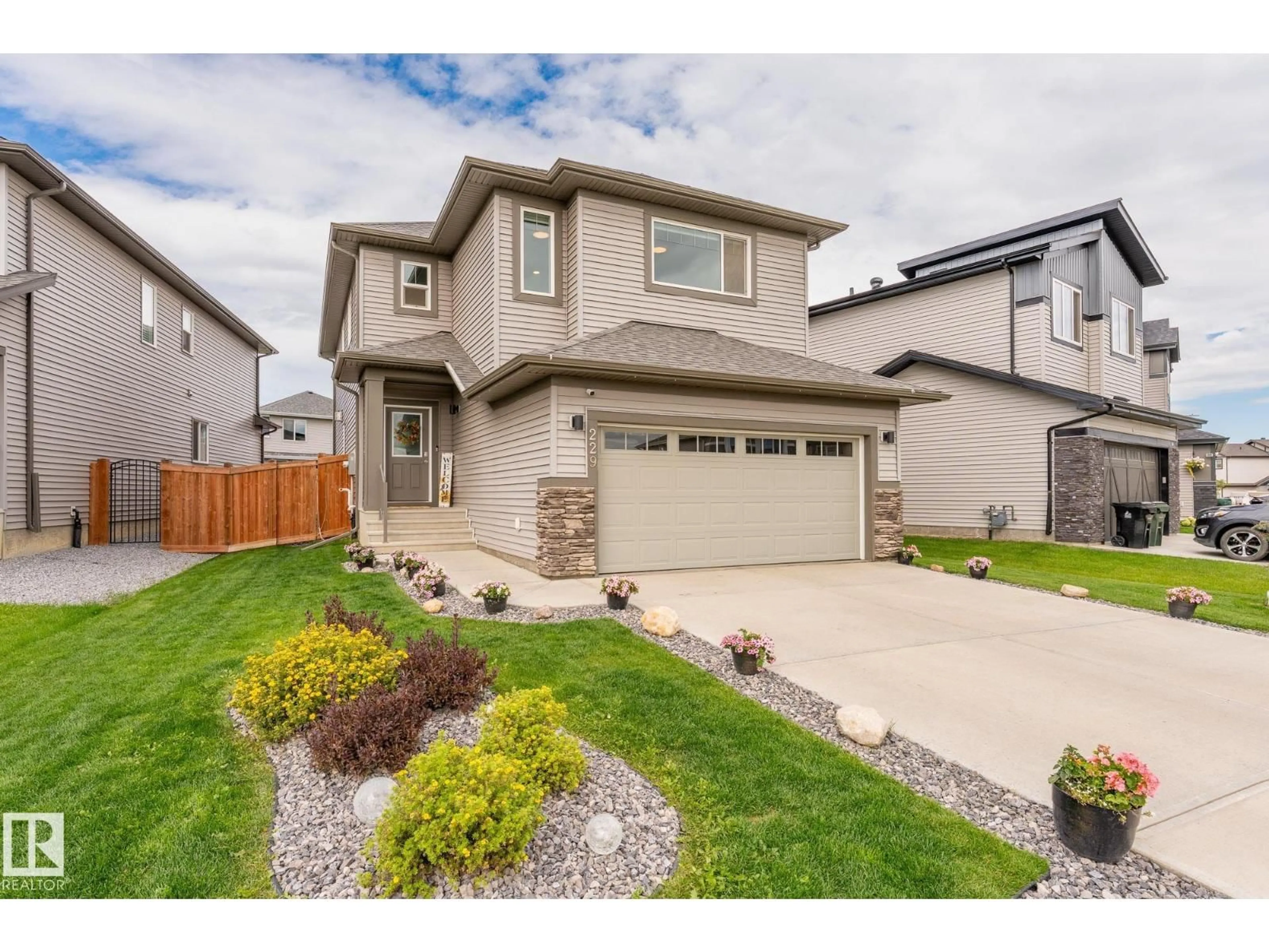 Home with vinyl exterior material, street for 229 CALEDON CR, Spruce Grove Alberta T7X0Y6