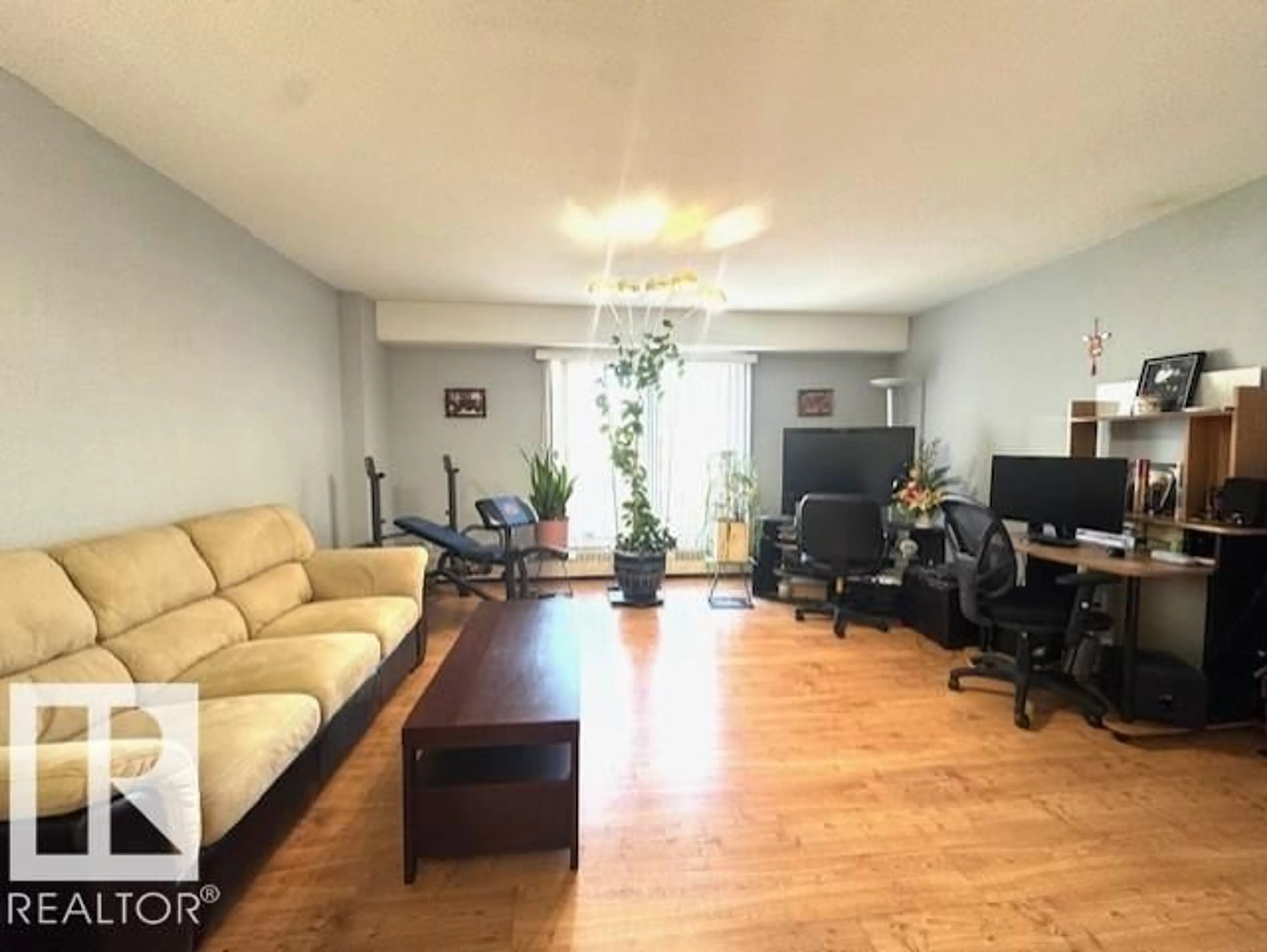 Living room with furniture, unknown for 205 11211 85 ST NW, Edmonton Alberta T5B4T7