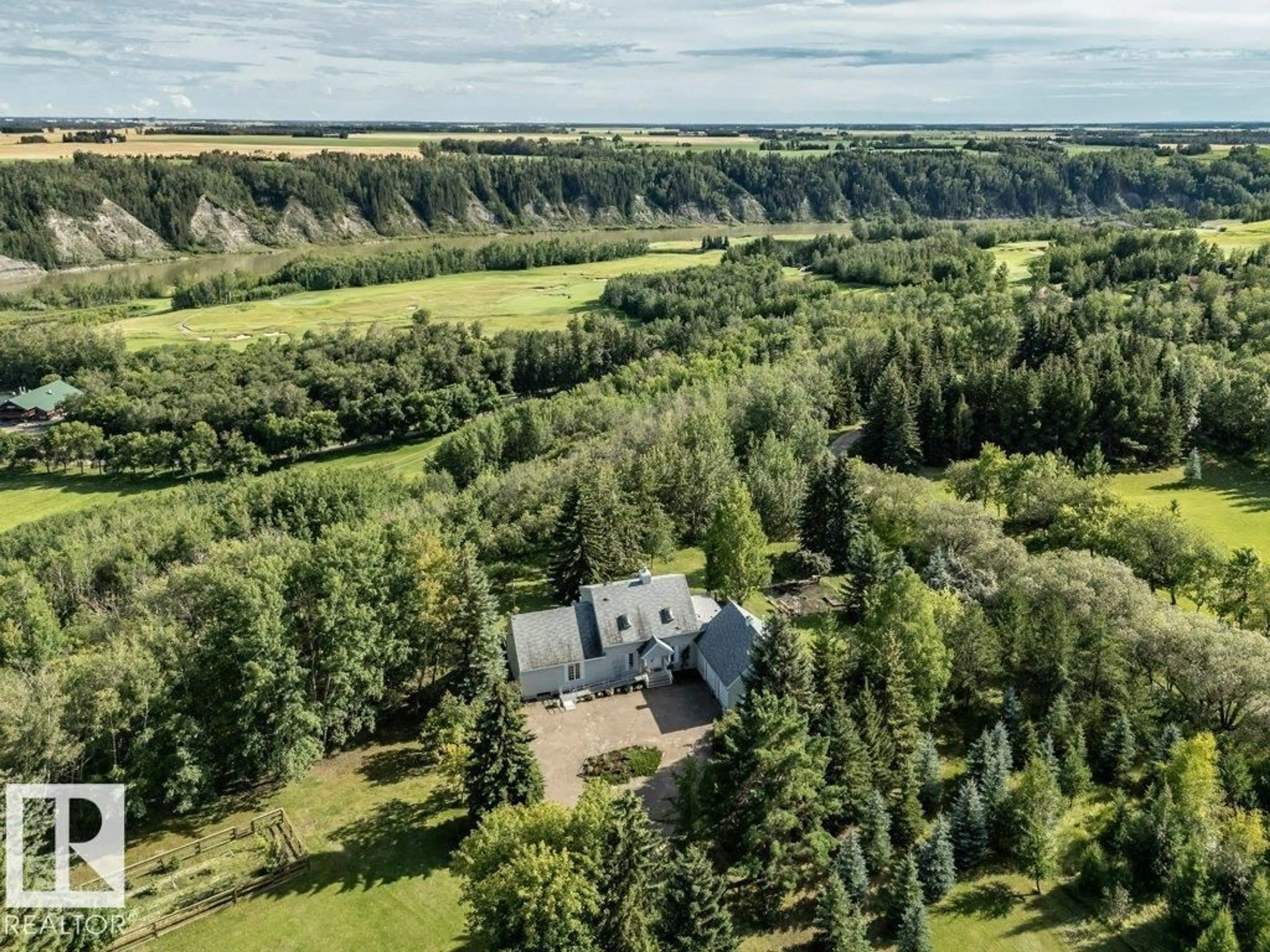 A pic from outside/outdoor area/front of a property/back of a property/a pic from drone, forest/trees view for 51127 - 11 RGE RD 255, Rural Parkland County Alberta T7Y1A8