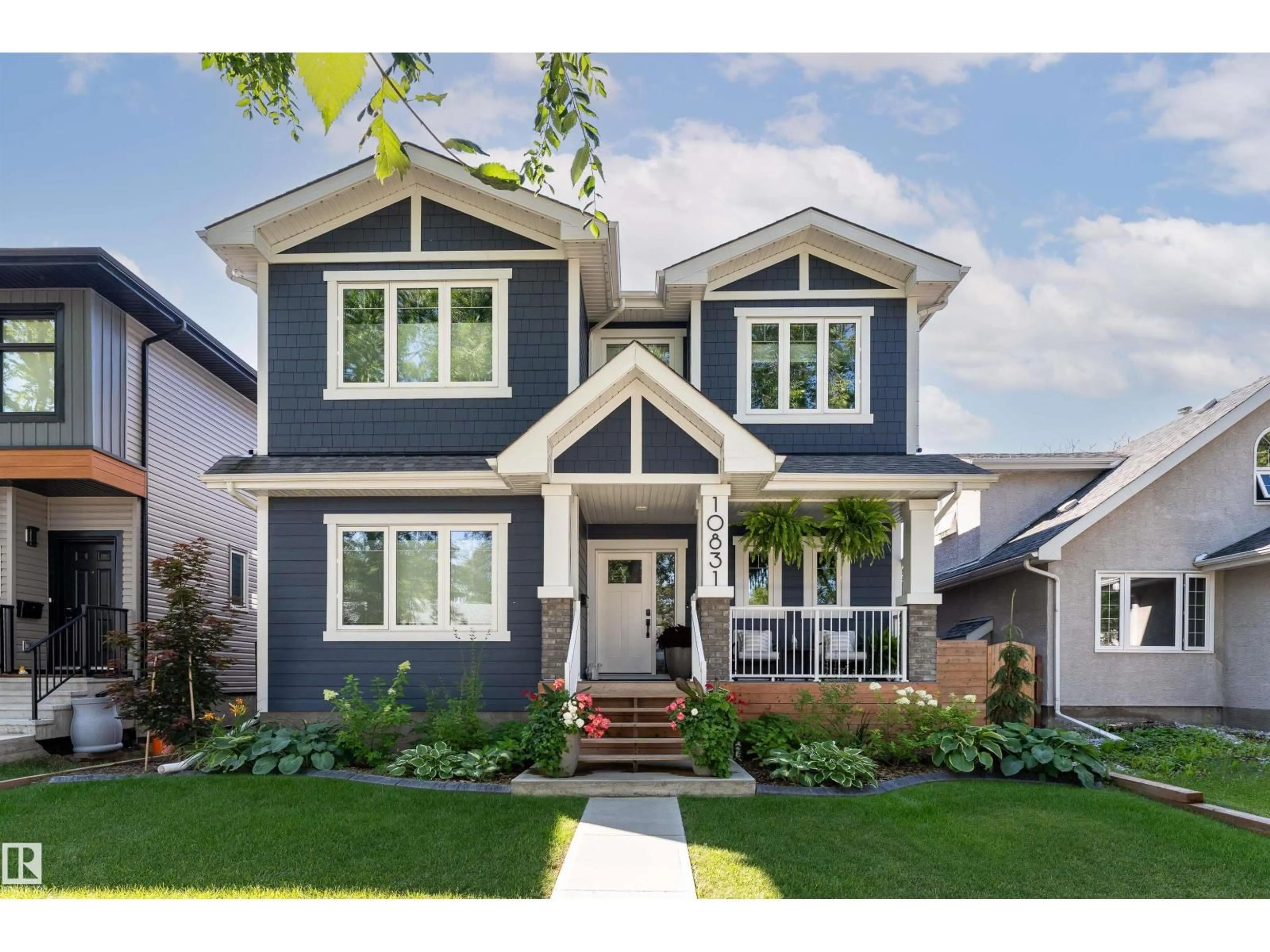 Home with vinyl exterior material, street for NW - 10831 65 AV, Edmonton Alberta T6H1V8