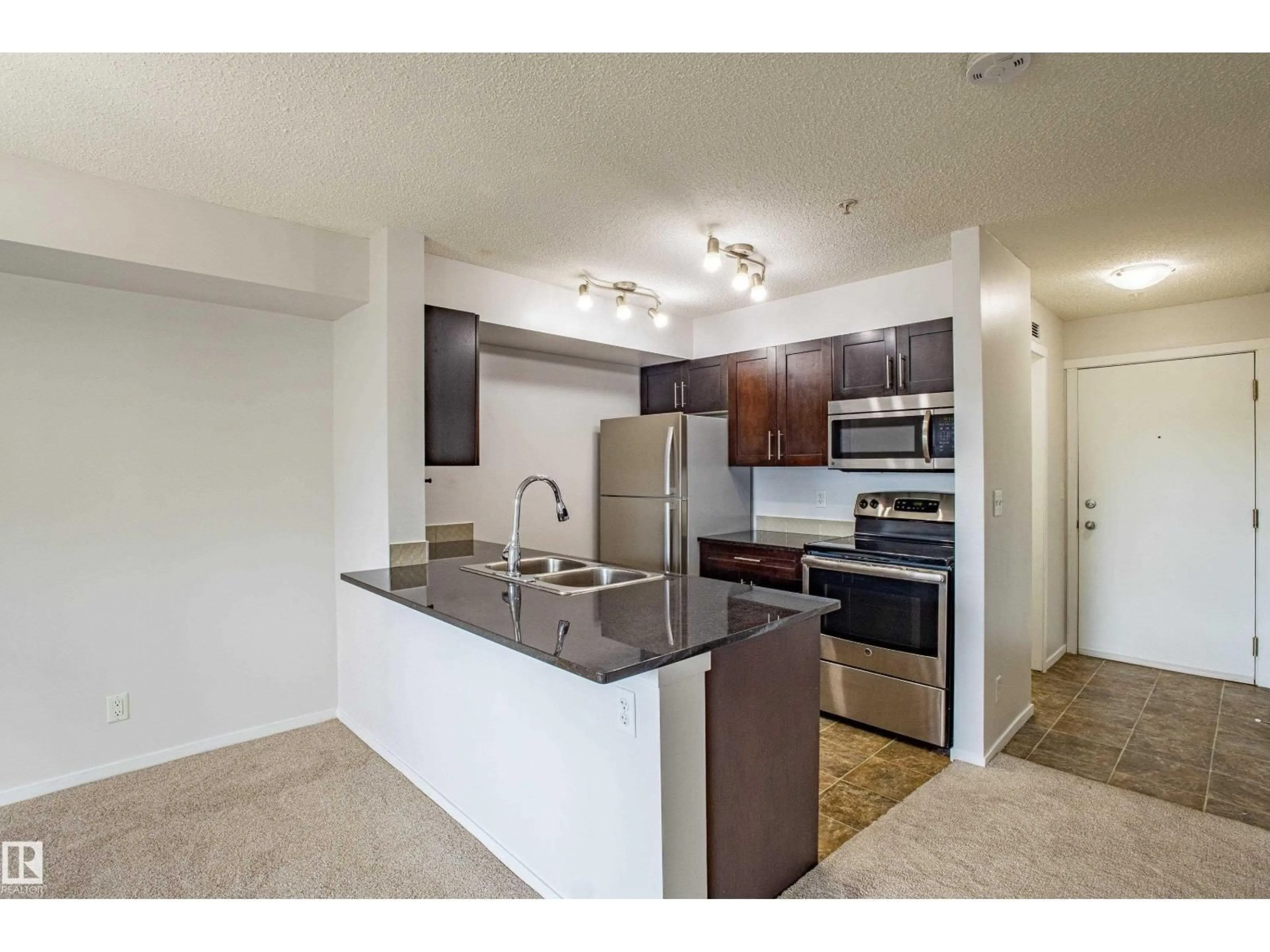 Standard kitchen, unknown for #108 - 5810 MULLEN PL, Edmonton Alberta T6R0W3