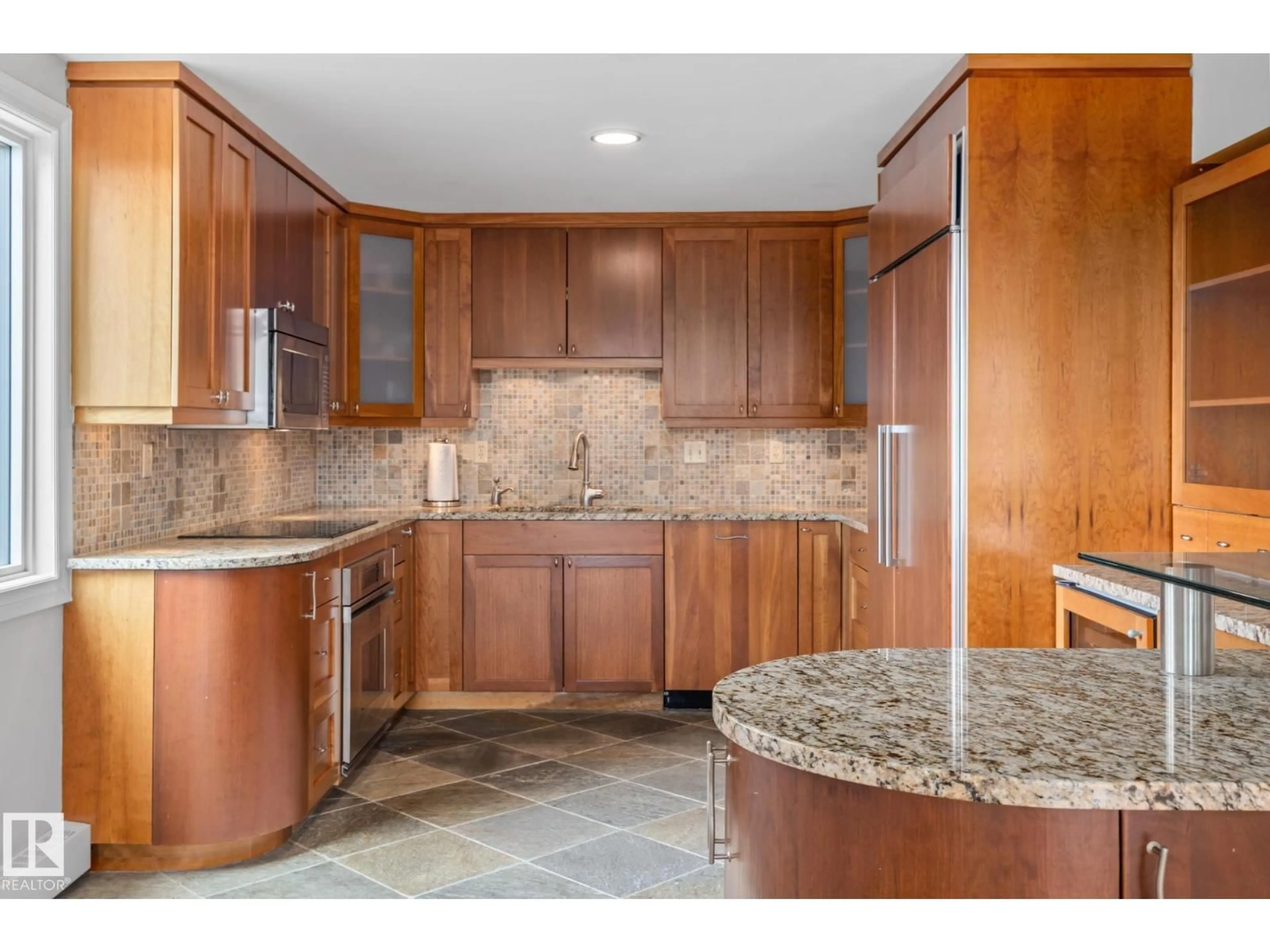 Open concept kitchen, ceramic/tile floor for 202 - 10010 119 ST, Edmonton Alberta T5K1Y8