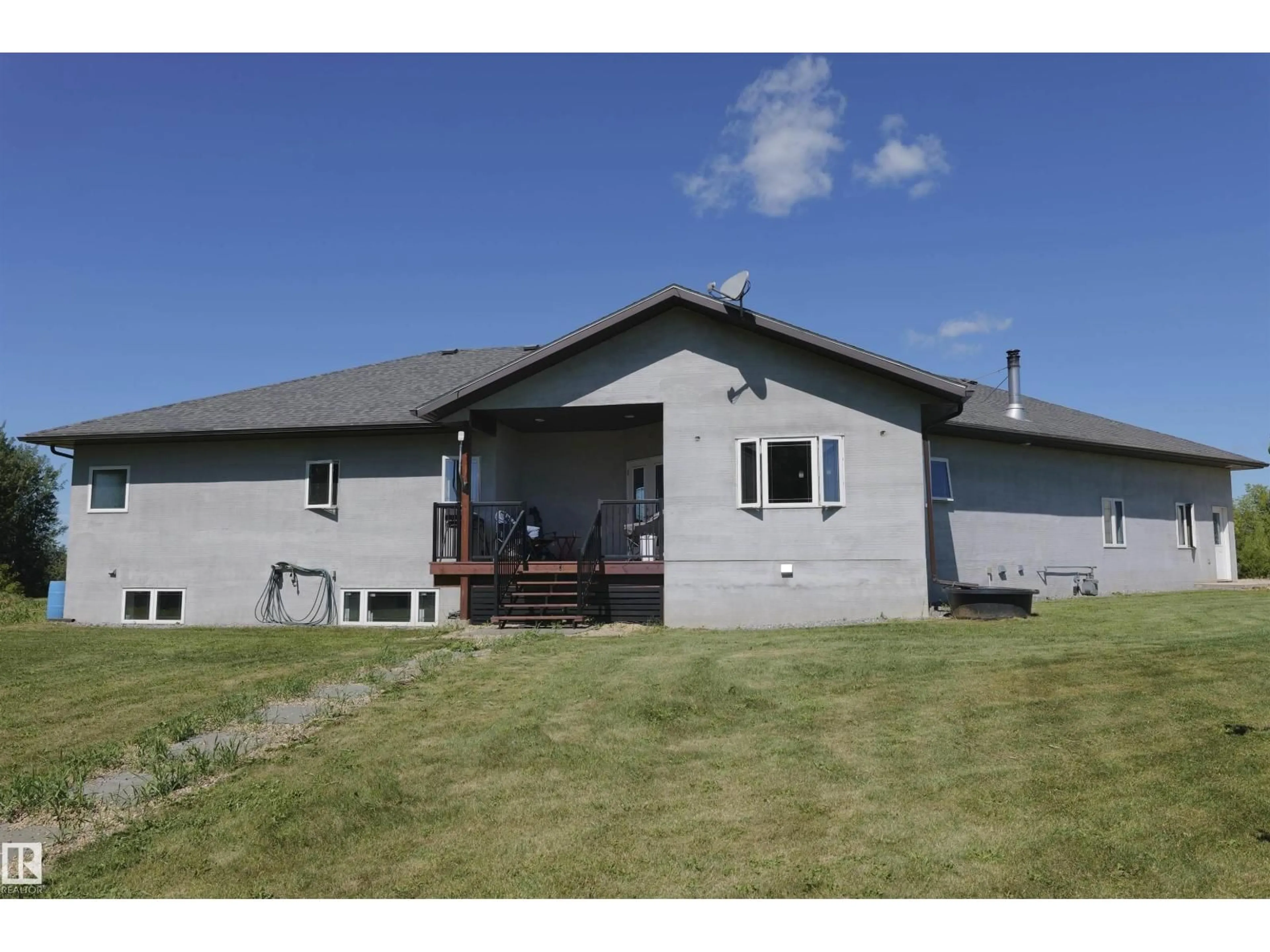 A pic from outside/outdoor area/front of a property/back of a property/a pic from drone, building for 59529A RGE RD 33, Rural Barrhead County Alberta T7N1N2