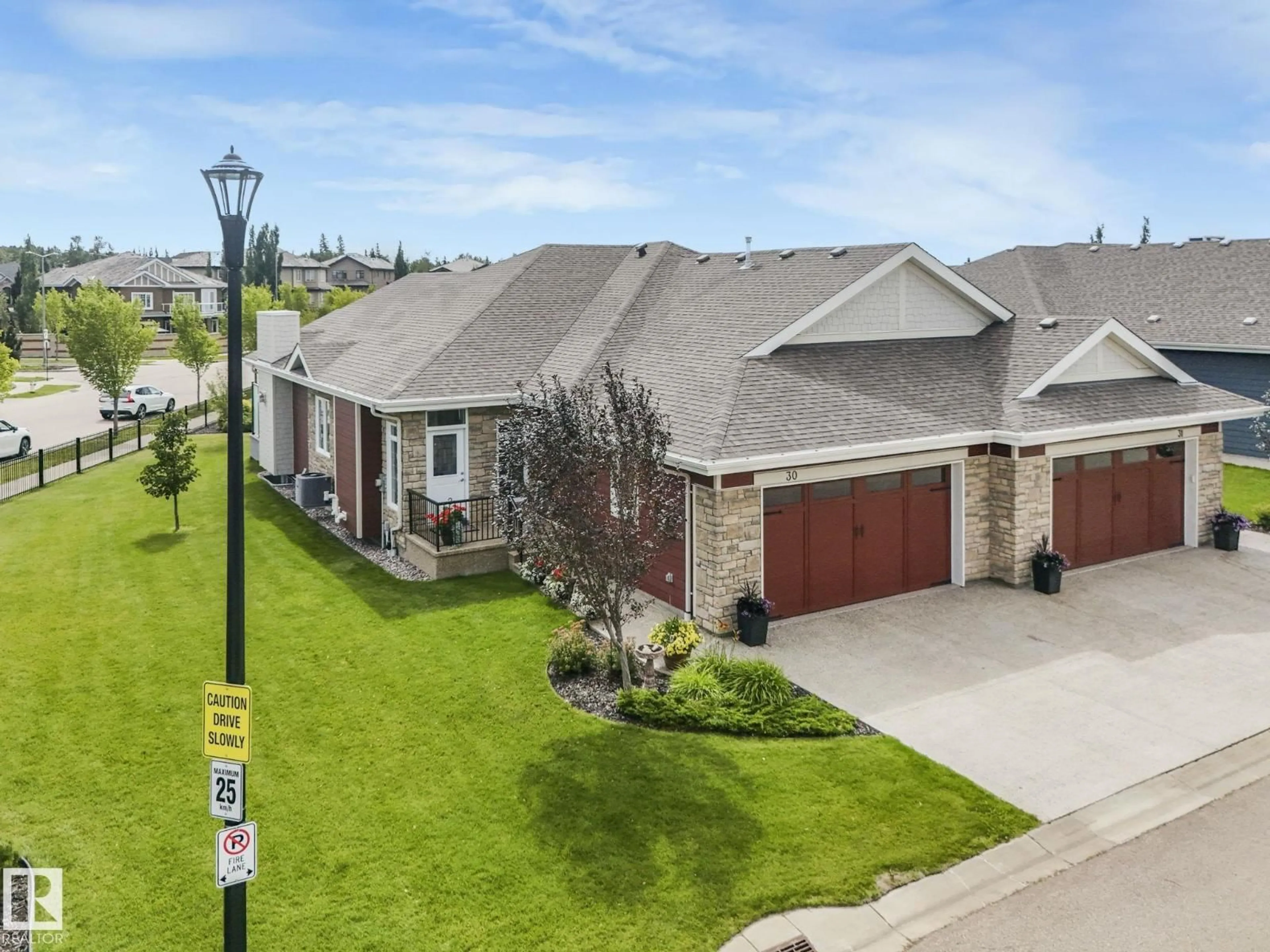 A pic from outside/outdoor area/front of a property/back of a property/a pic from drone, street for 3090 - 30 CAMERON HEIGHTS WY, Edmonton Alberta T6M0S7