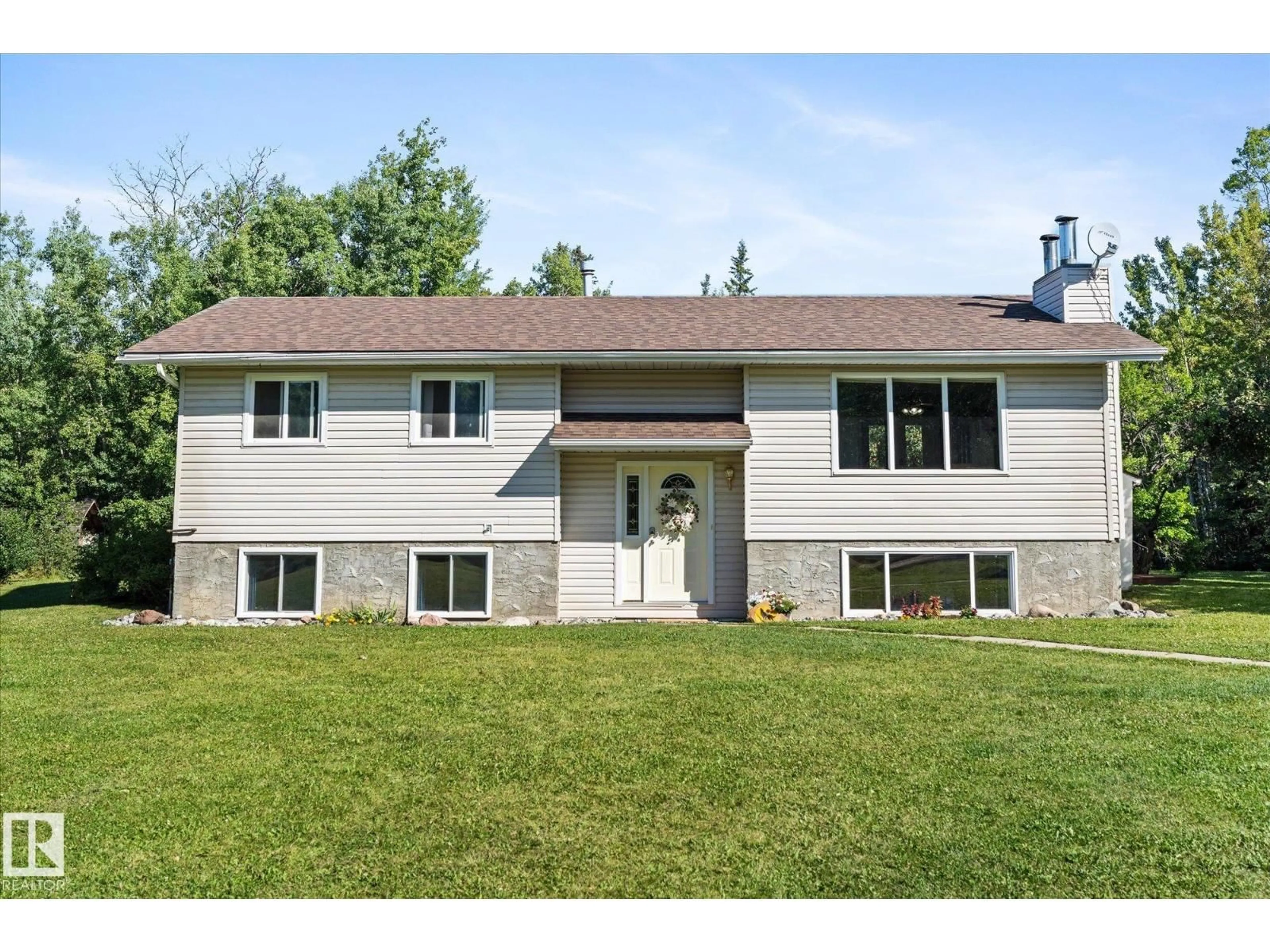 Home with vinyl exterior material, street for 11A - 53301 RGE ROAD 32, Rural Parkland County Alberta T0E0N0