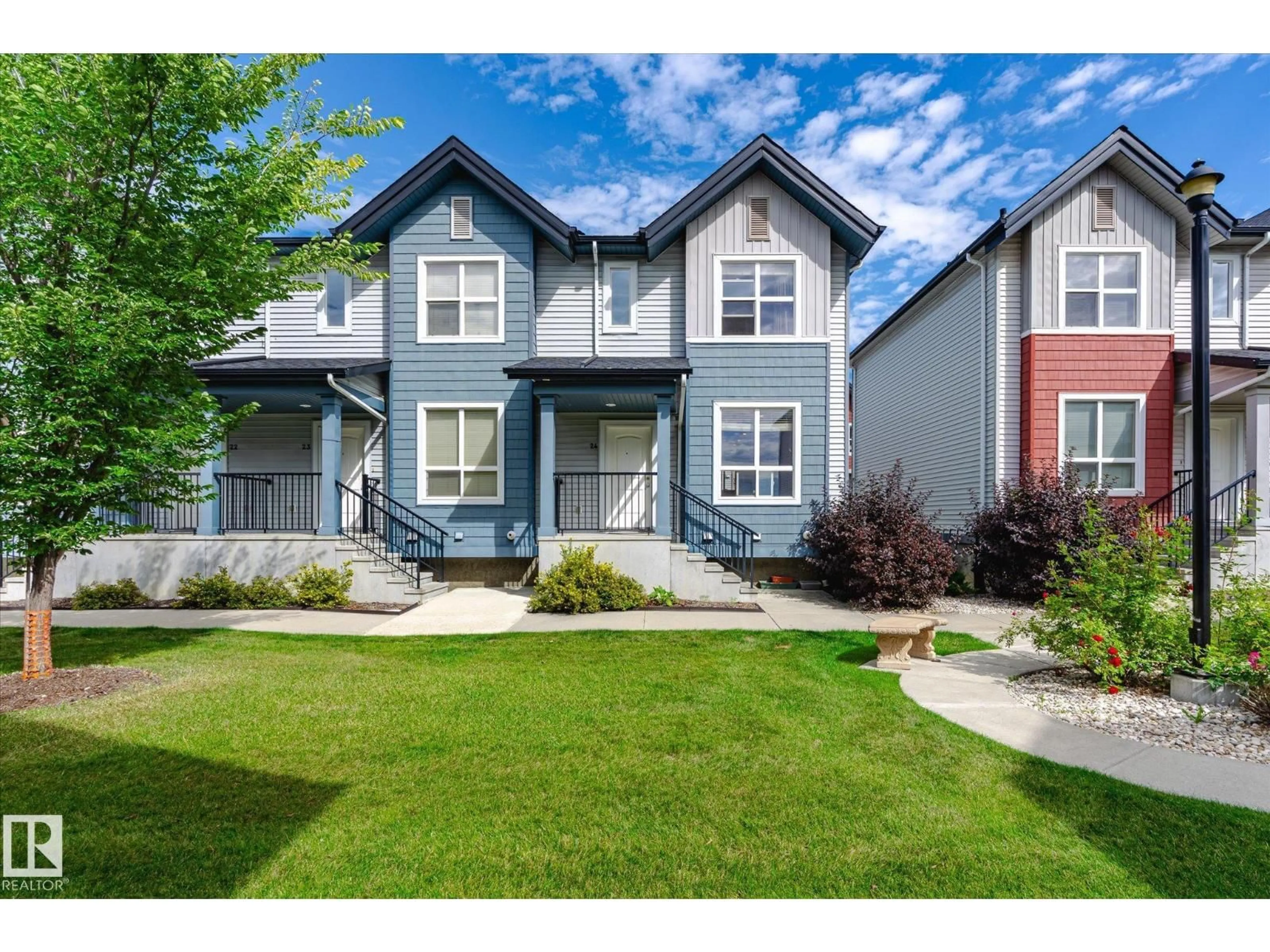 Home with vinyl exterior material, street for 6075 - 24 SCHONSEE WY, Edmonton Alberta T5Z0H4