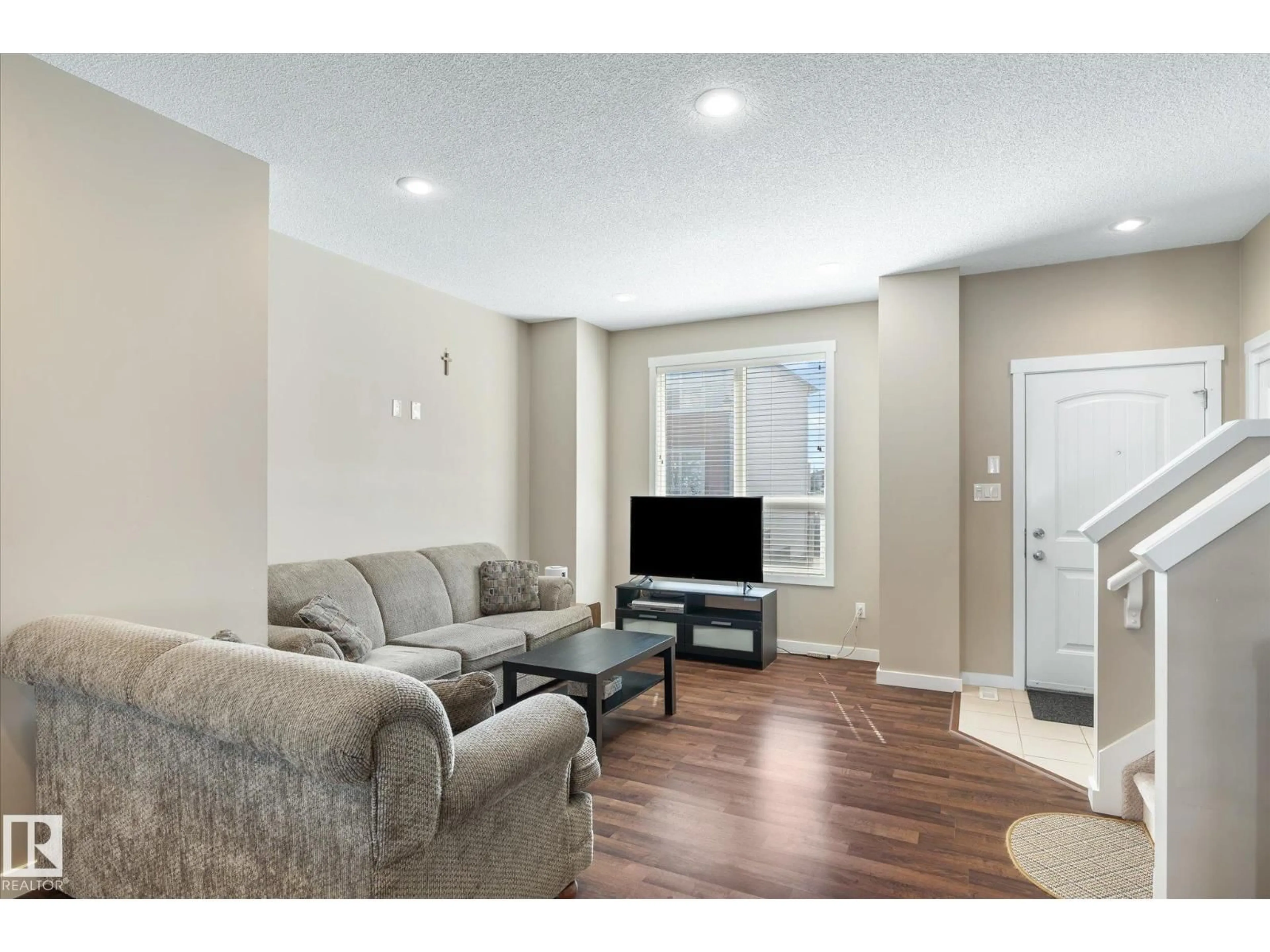 Living room with furniture, unknown for 6075 - 24 SCHONSEE WY, Edmonton Alberta T5Z0H4