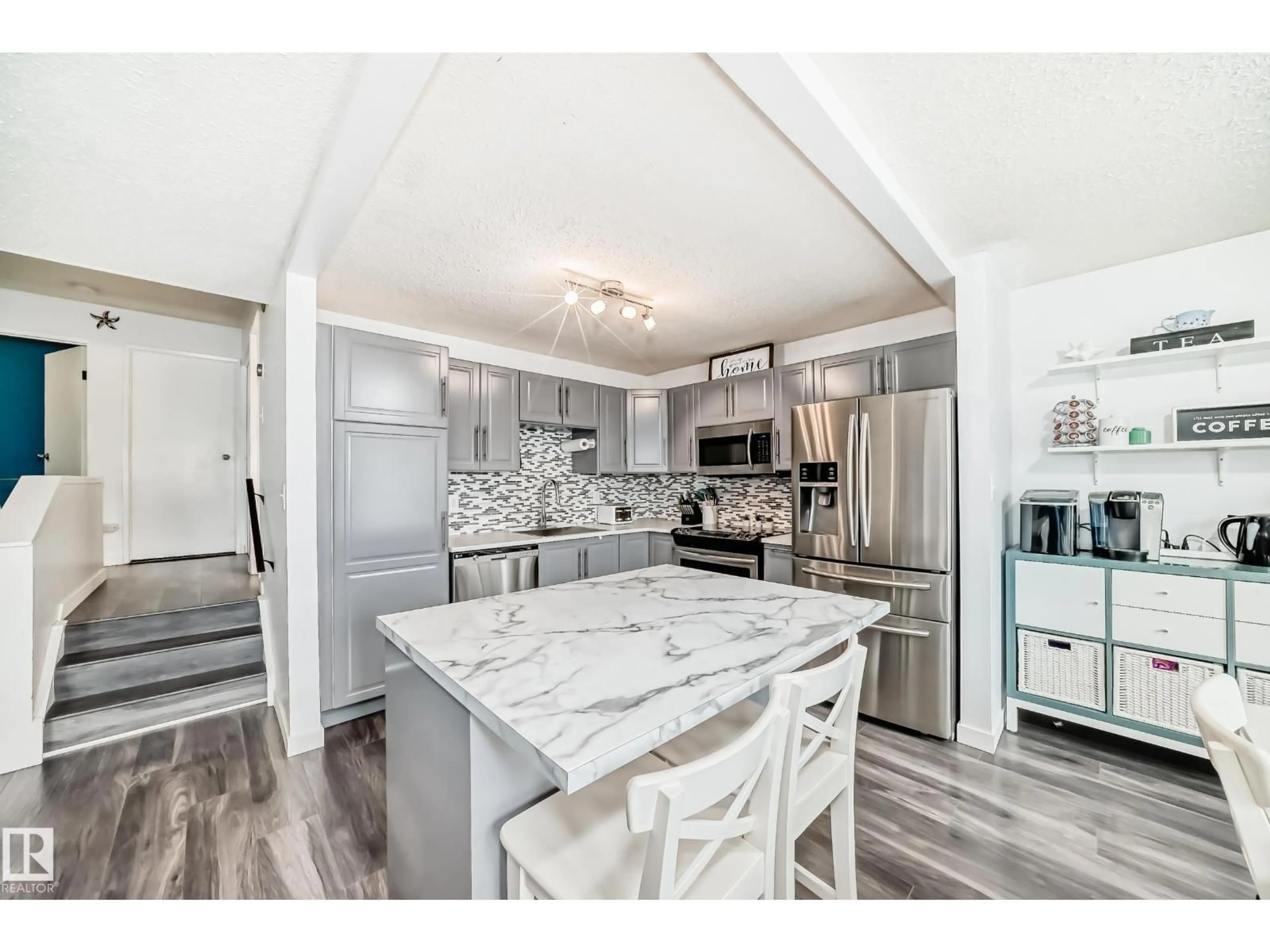 Open concept kitchen, ceramic/tile floor for NW - 1012 55 ST, Edmonton Alberta T6L1Y7