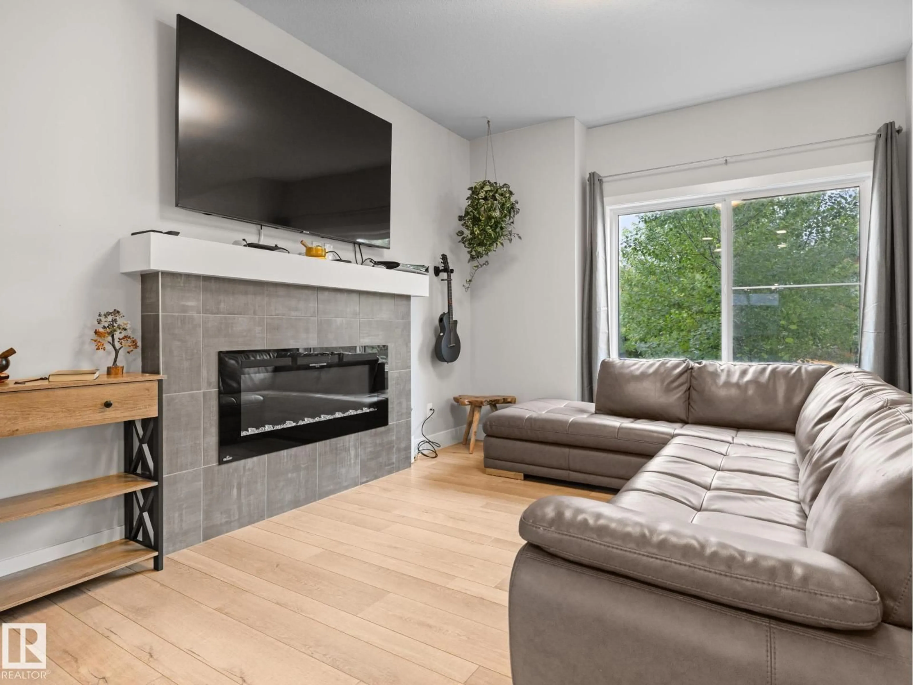 Living room with furniture, wood/laminate floor for 13 AMESBURY WD, Sherwood Park Alberta T8B0B4