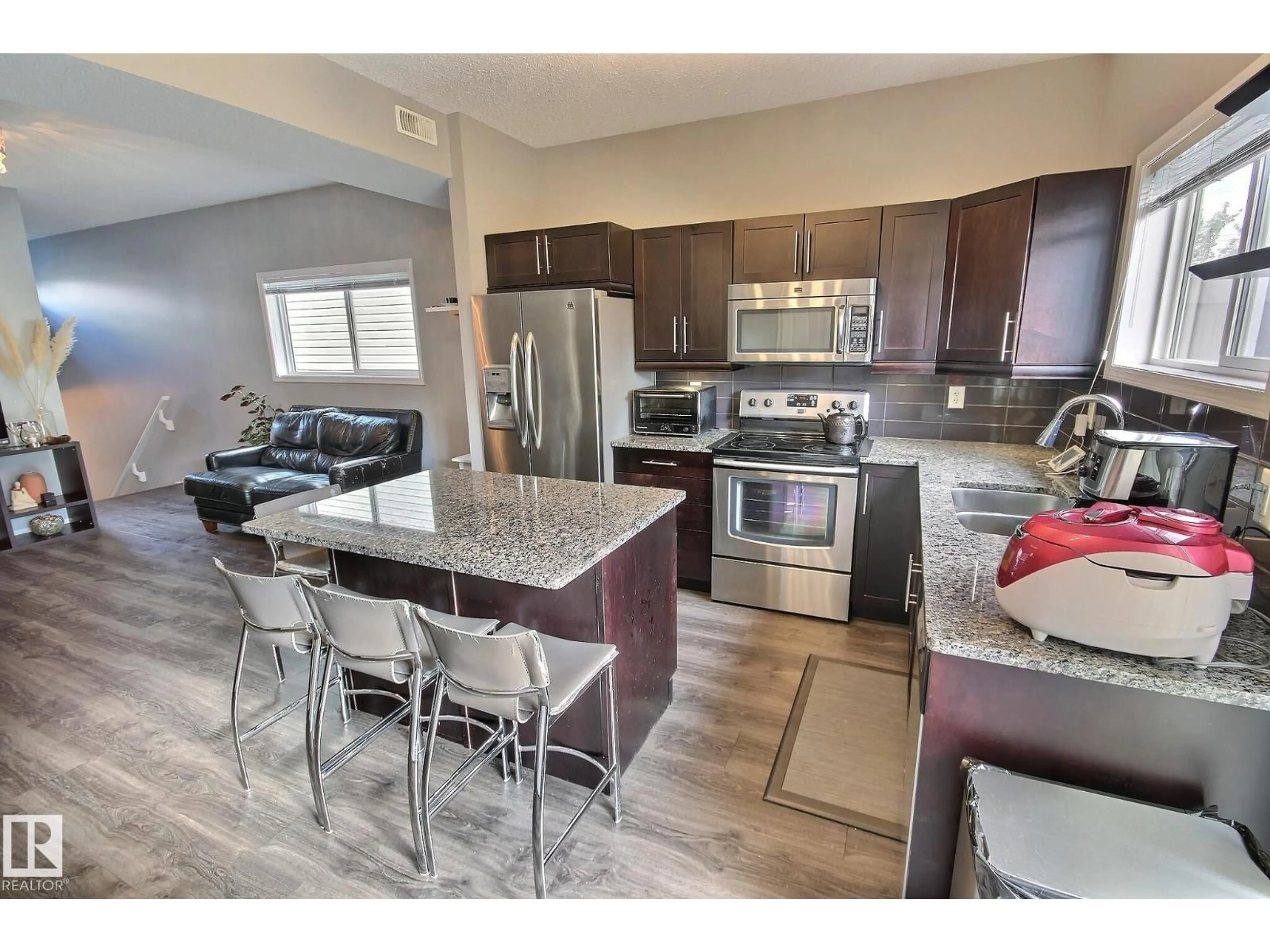 Open concept kitchen, unknown for 16 6520 2 AV SW, Edmonton Alberta T6X1S4