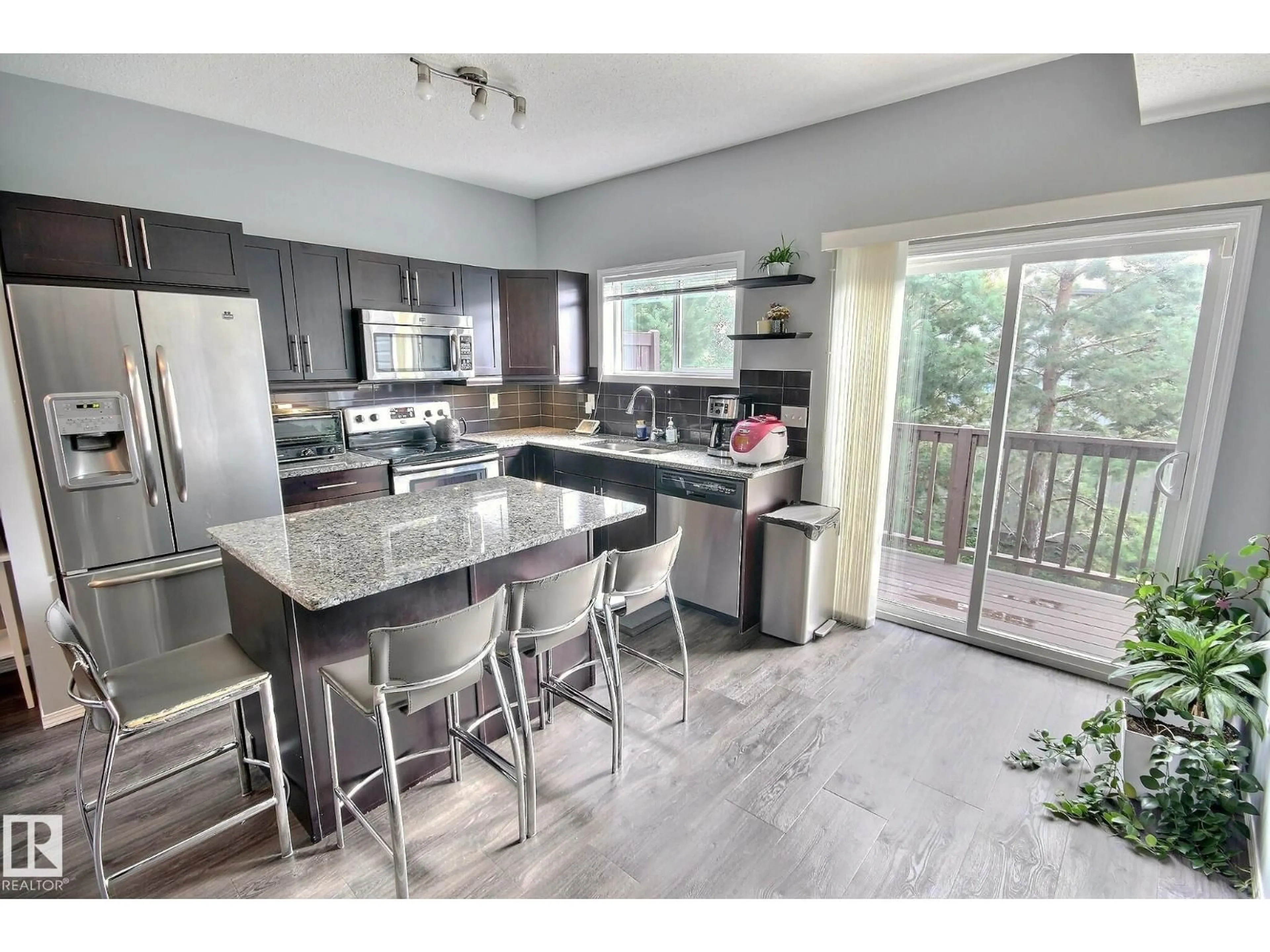 Open concept kitchen, unknown for 16 6520 2 AV SW, Edmonton Alberta T6X1S4