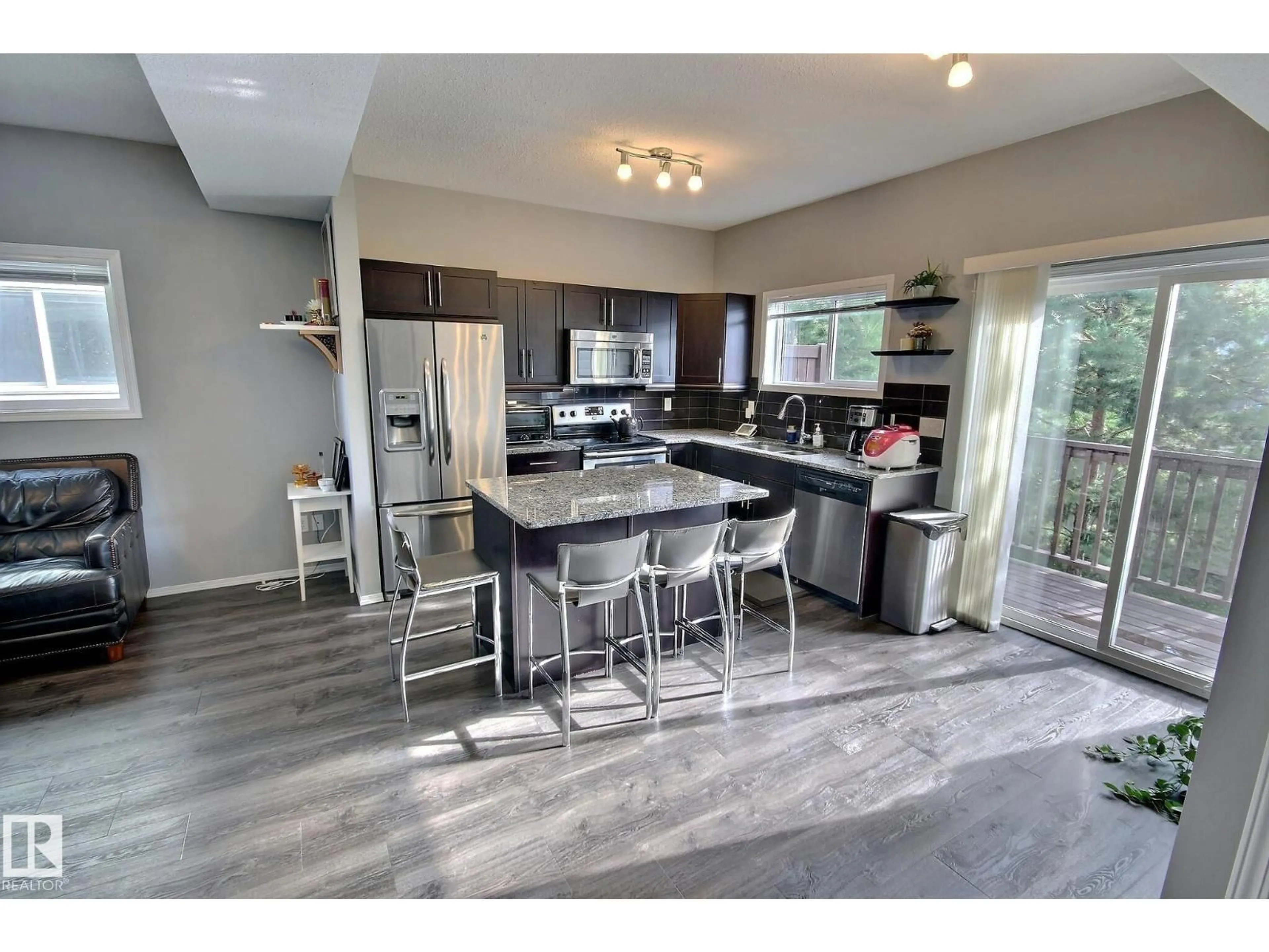 Open concept kitchen, ceramic/tile floor for 16 6520 2 AV SW, Edmonton Alberta T6X1S4