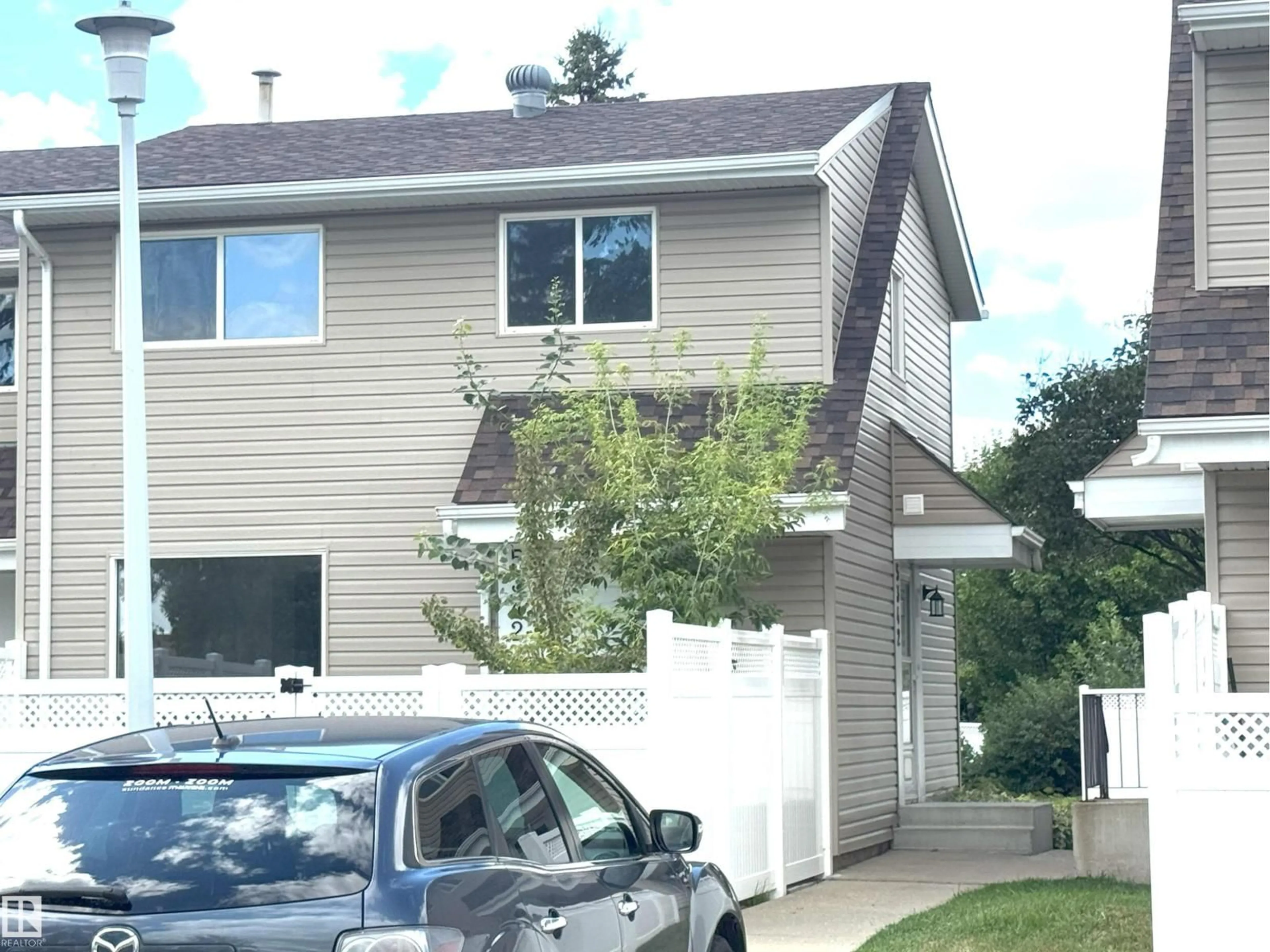 Home with vinyl exterior material, street for 5342 MCLEOD RD, Edmonton Alberta T5A3N9