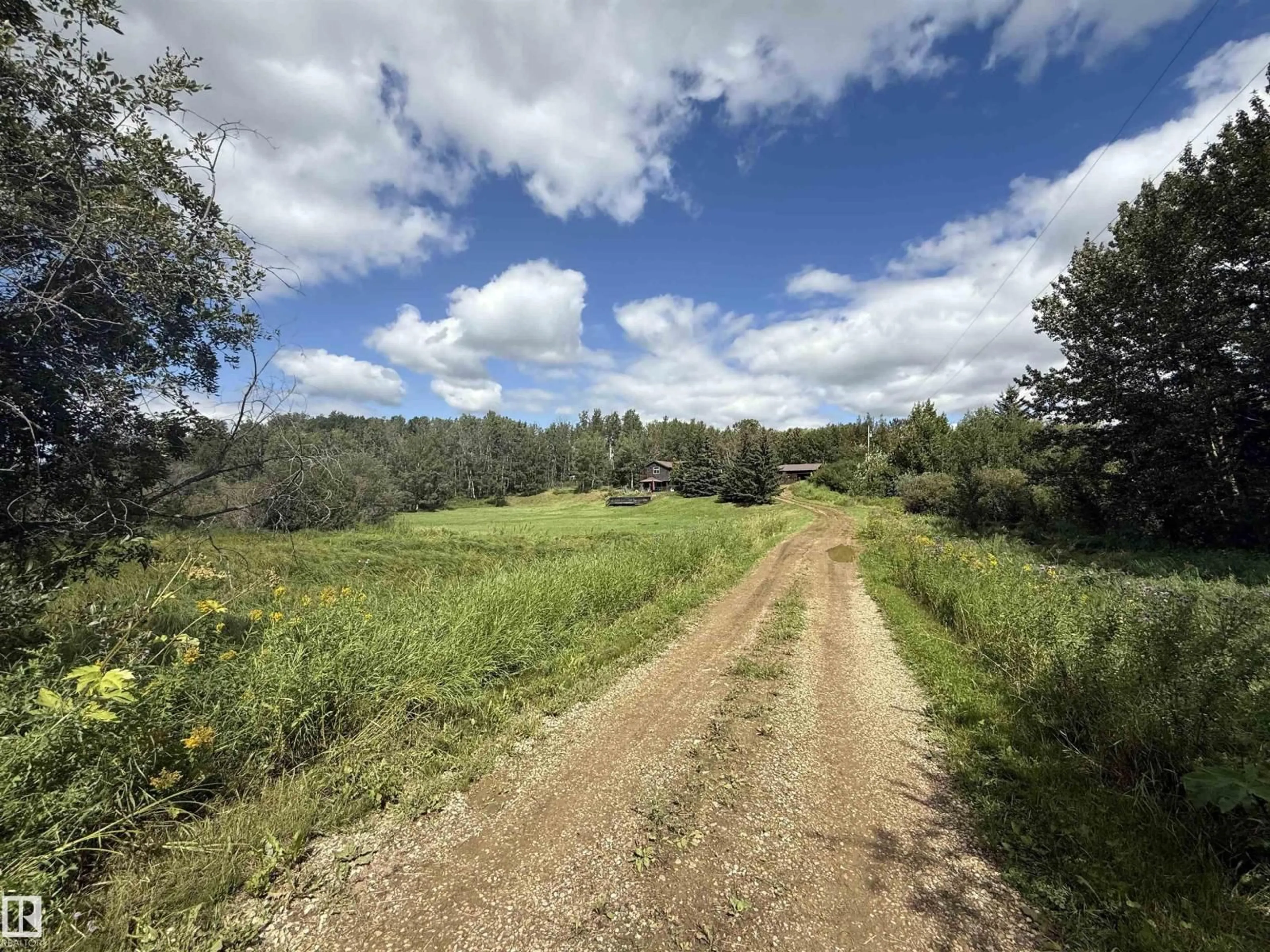 A pic from outside/outdoor area/front of a property/back of a property/a pic from drone, forest/trees view for #2 - 52510 RGE ROAD 25, Rural Parkland County Alberta T7Y2M2