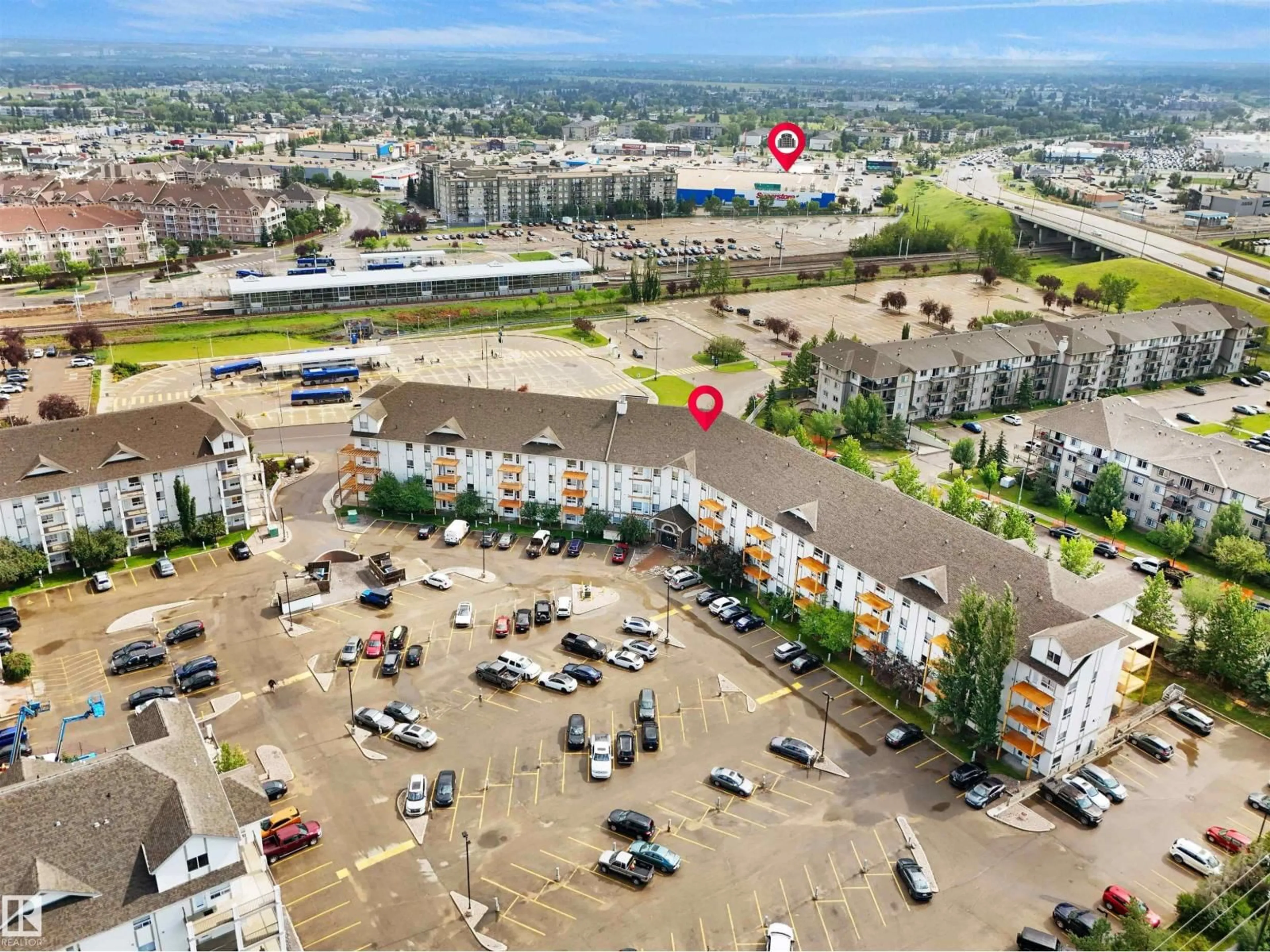 A pic from outside/outdoor area/front of a property/back of a property/a pic from drone, unknown for 320 - 2311 CLAREVIEW STATION DR, Edmonton Alberta T5Y0E5