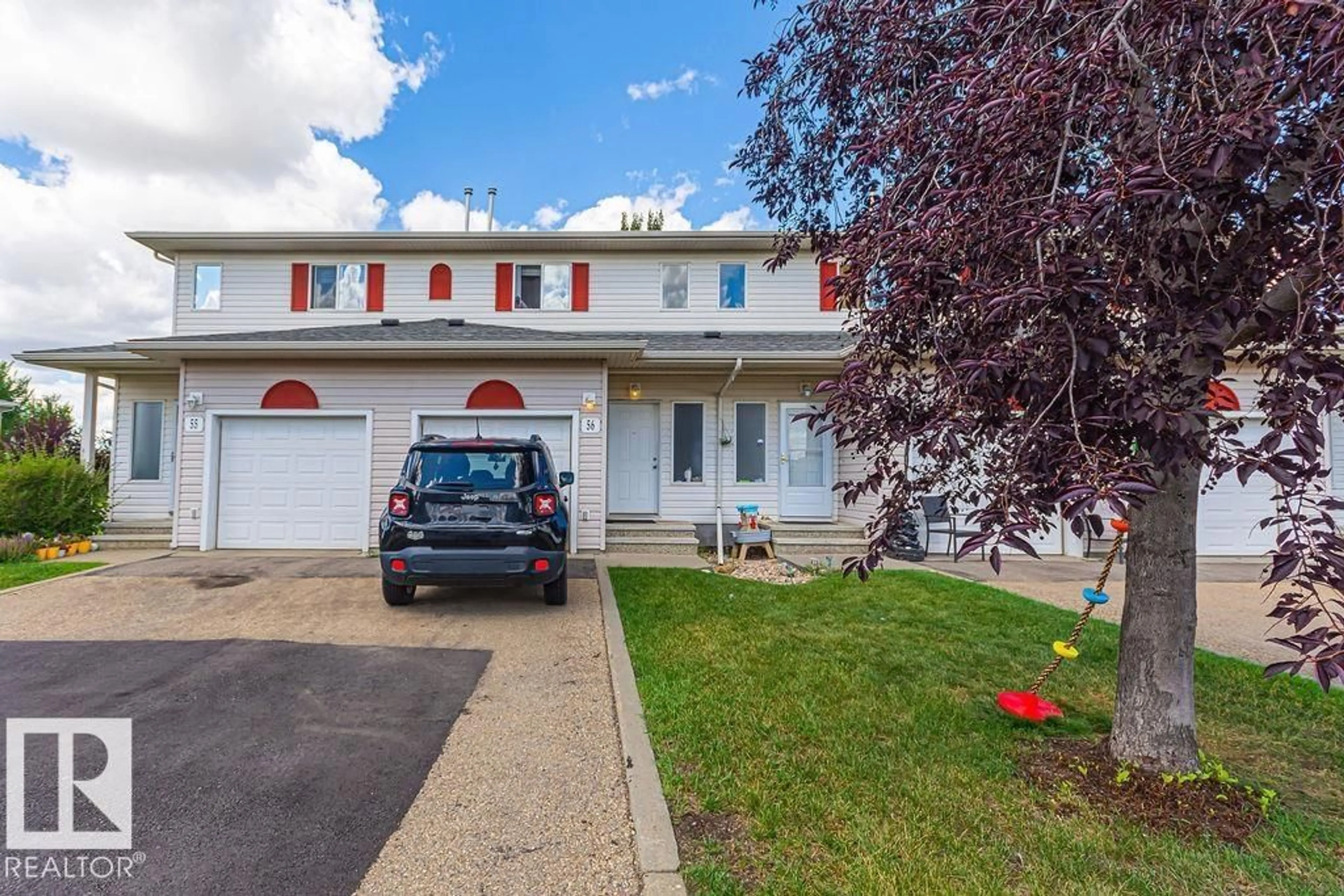 Home with vinyl exterior material, street for 451 - 56 HYNDMAN CR, Edmonton Alberta T5A5J3