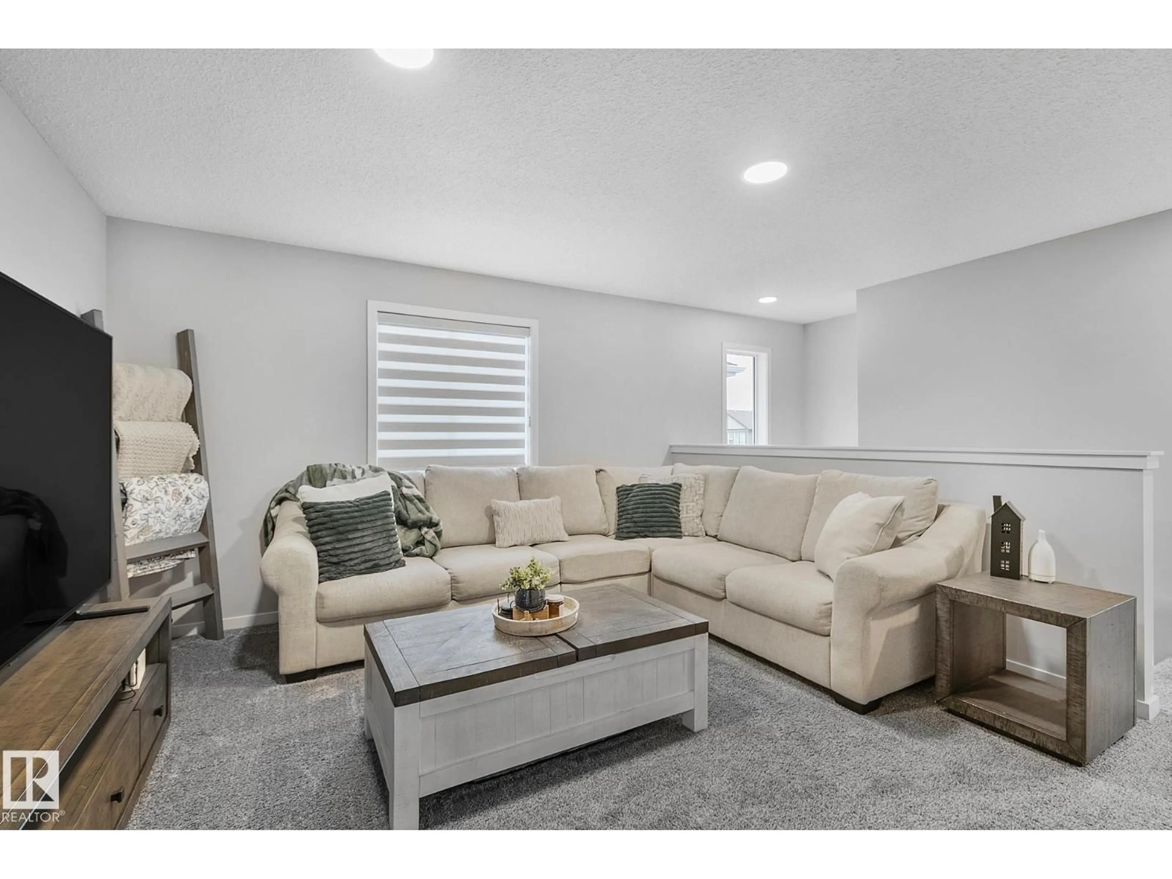 Living room with furniture, unknown for NW - 5740 175B AV, Edmonton Alberta T5W3V6
