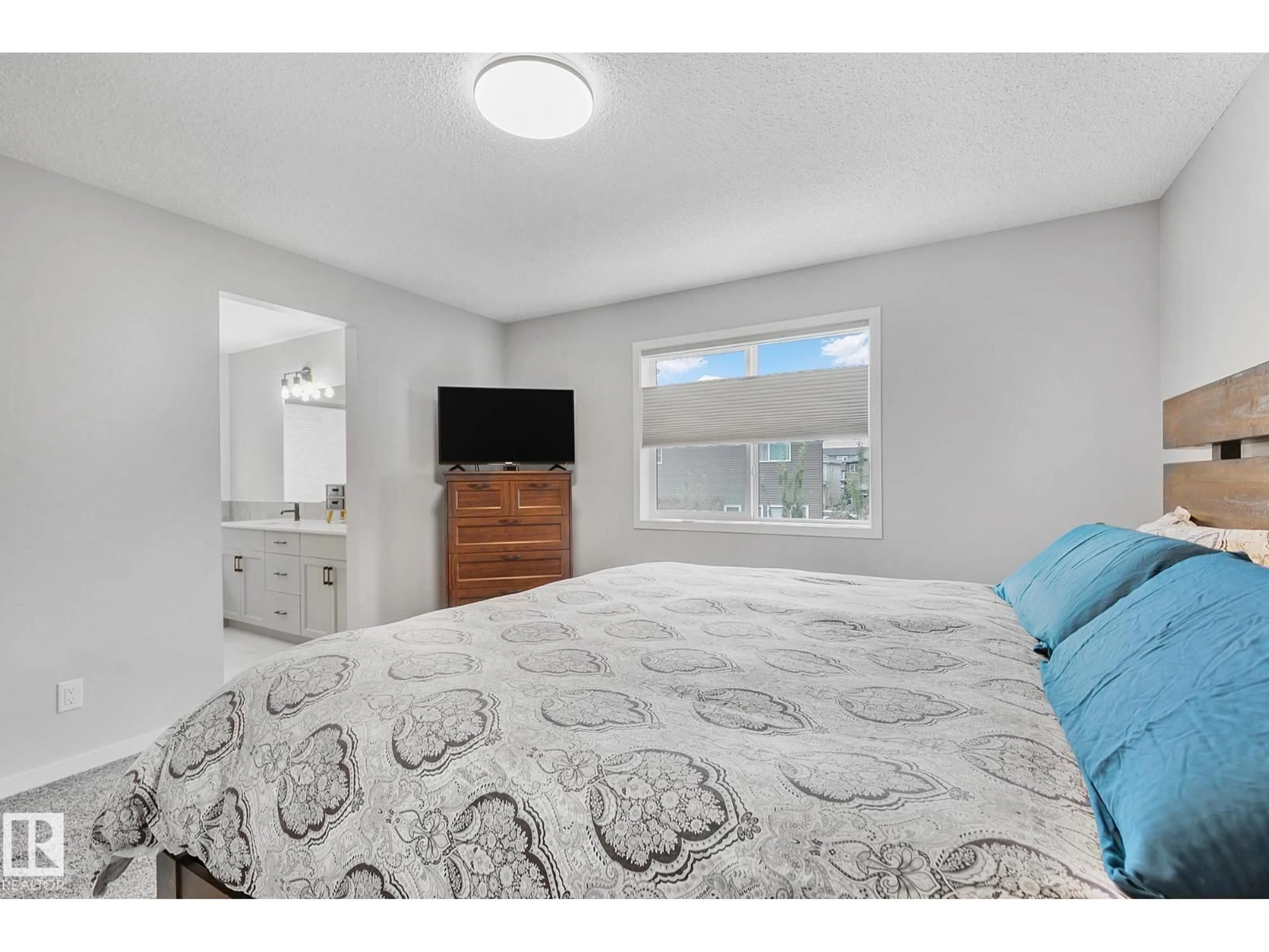 Bedroom with bed, unknown for NW - 5740 175B AV, Edmonton Alberta T5W3V6