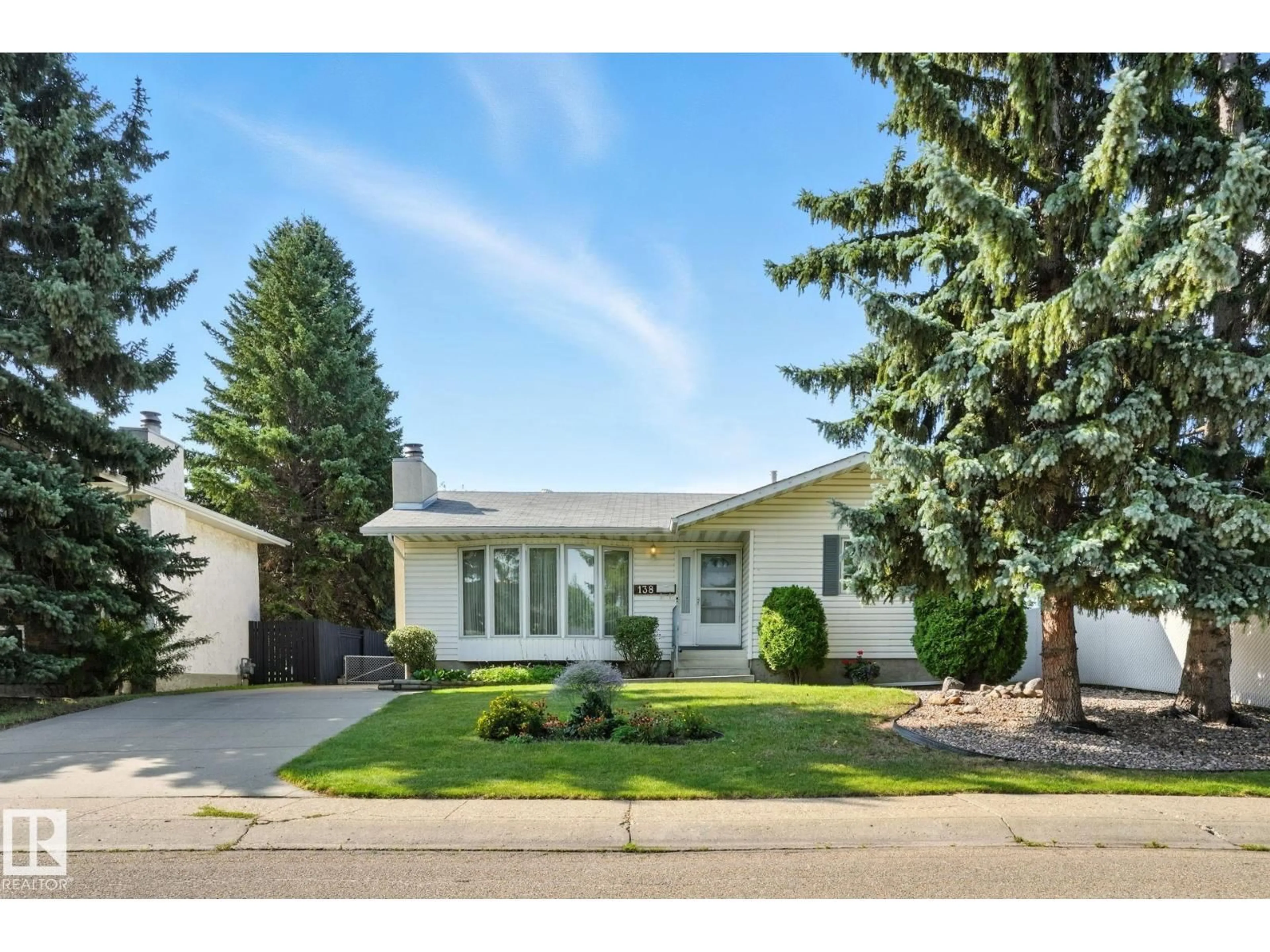 Home with vinyl exterior material, street for 138 HARRISON DR, Edmonton Alberta T5A2R4