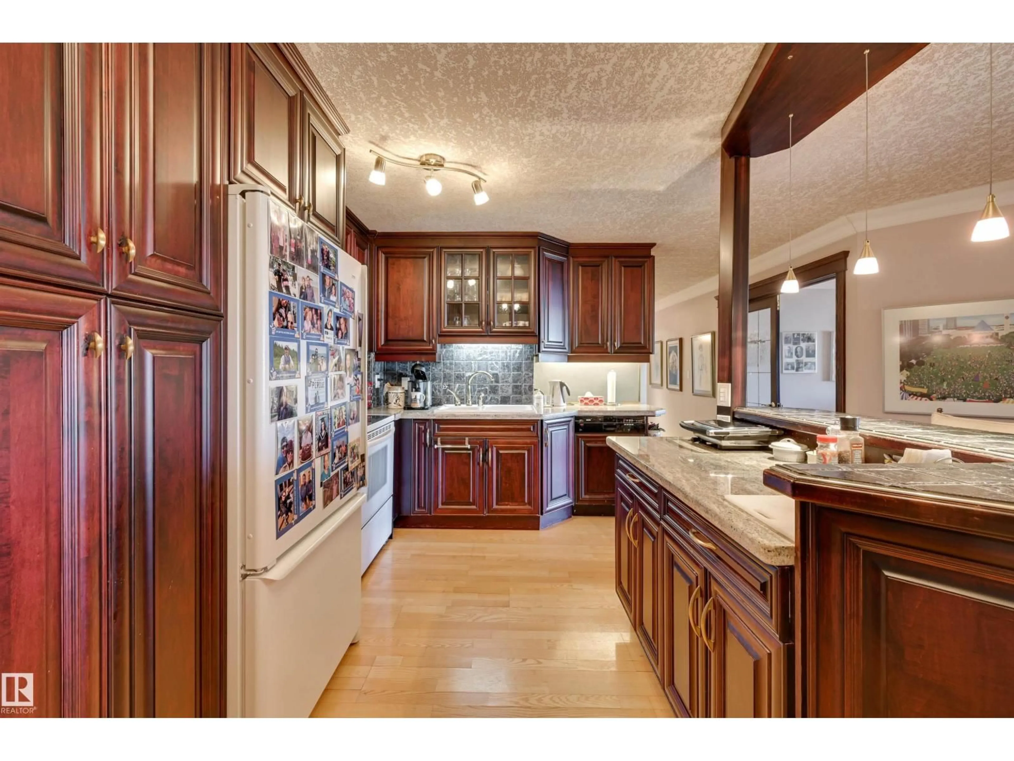 Open concept kitchen, ceramic/tile floor for 1102 - 11503 100 AV, Edmonton Alberta T5K2K7