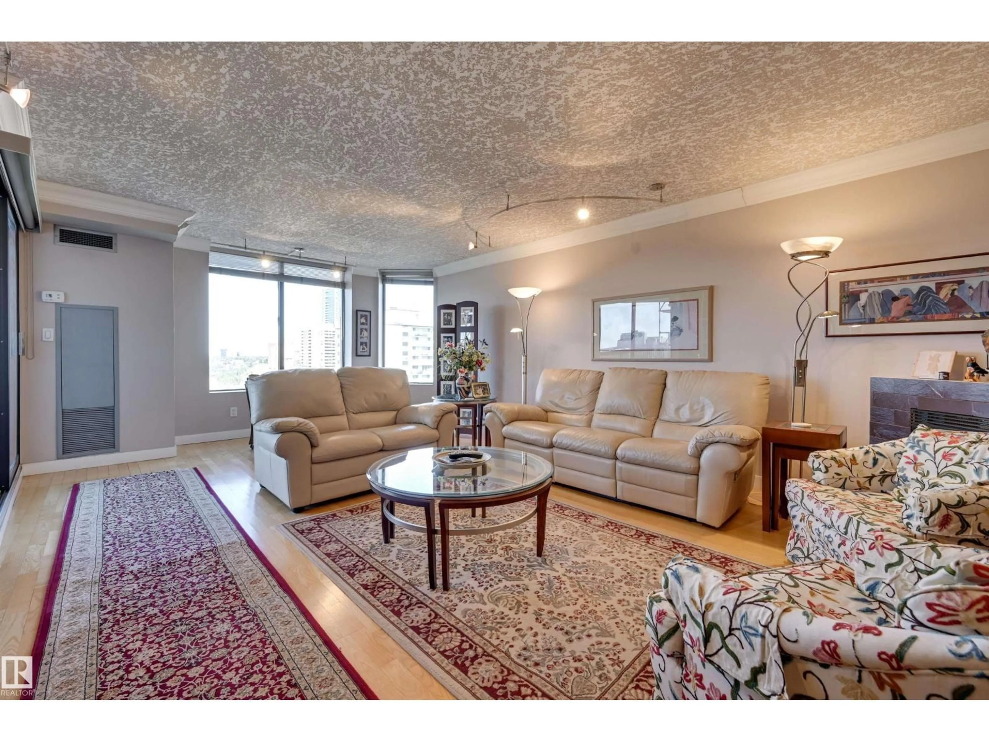 Living room with furniture, unknown for 1102 - 11503 100 AV, Edmonton Alberta T5K2K7