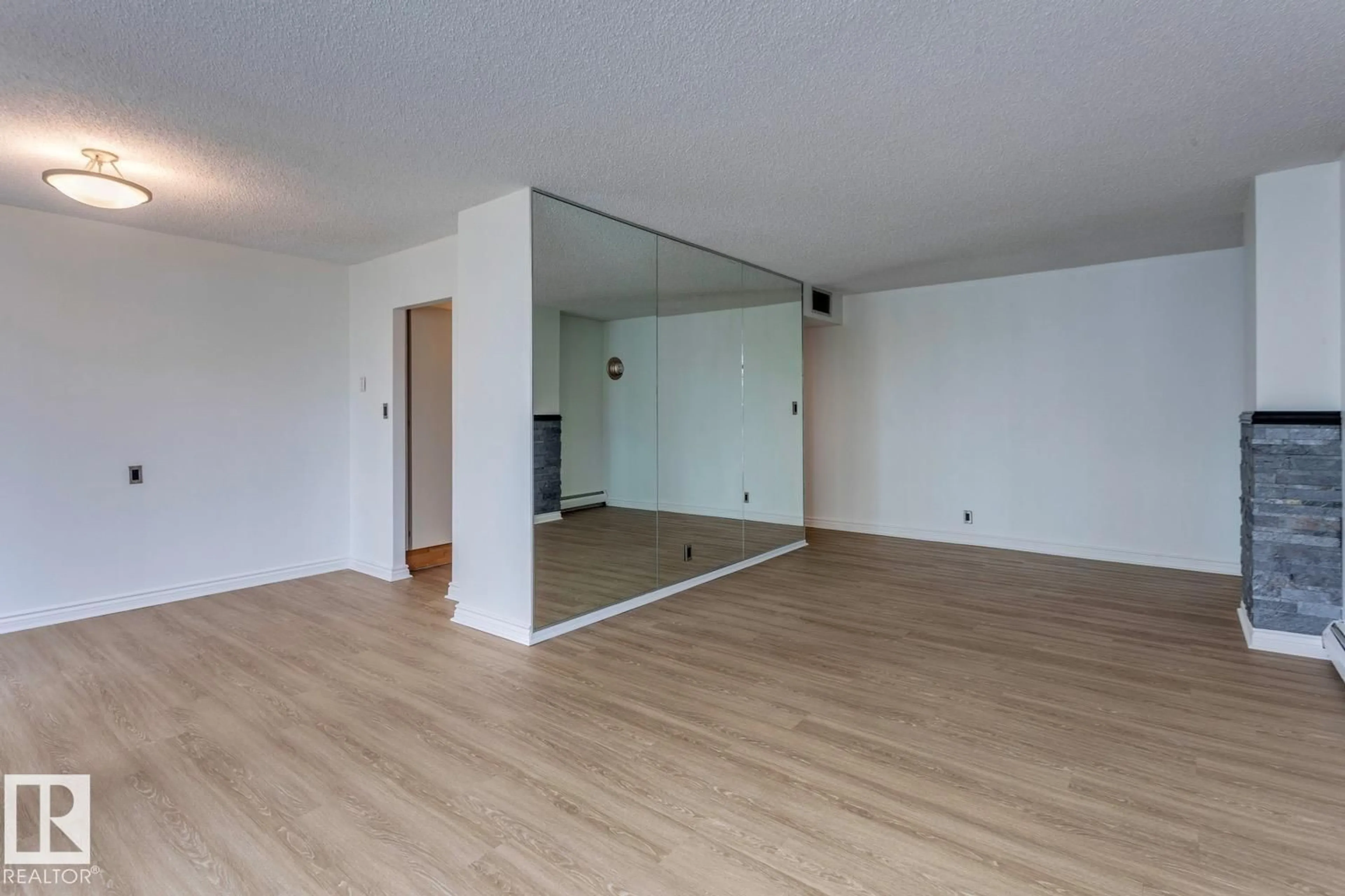 A pic of a room for 201 - 8340 JASPER AV, Edmonton Alberta T5H4C6