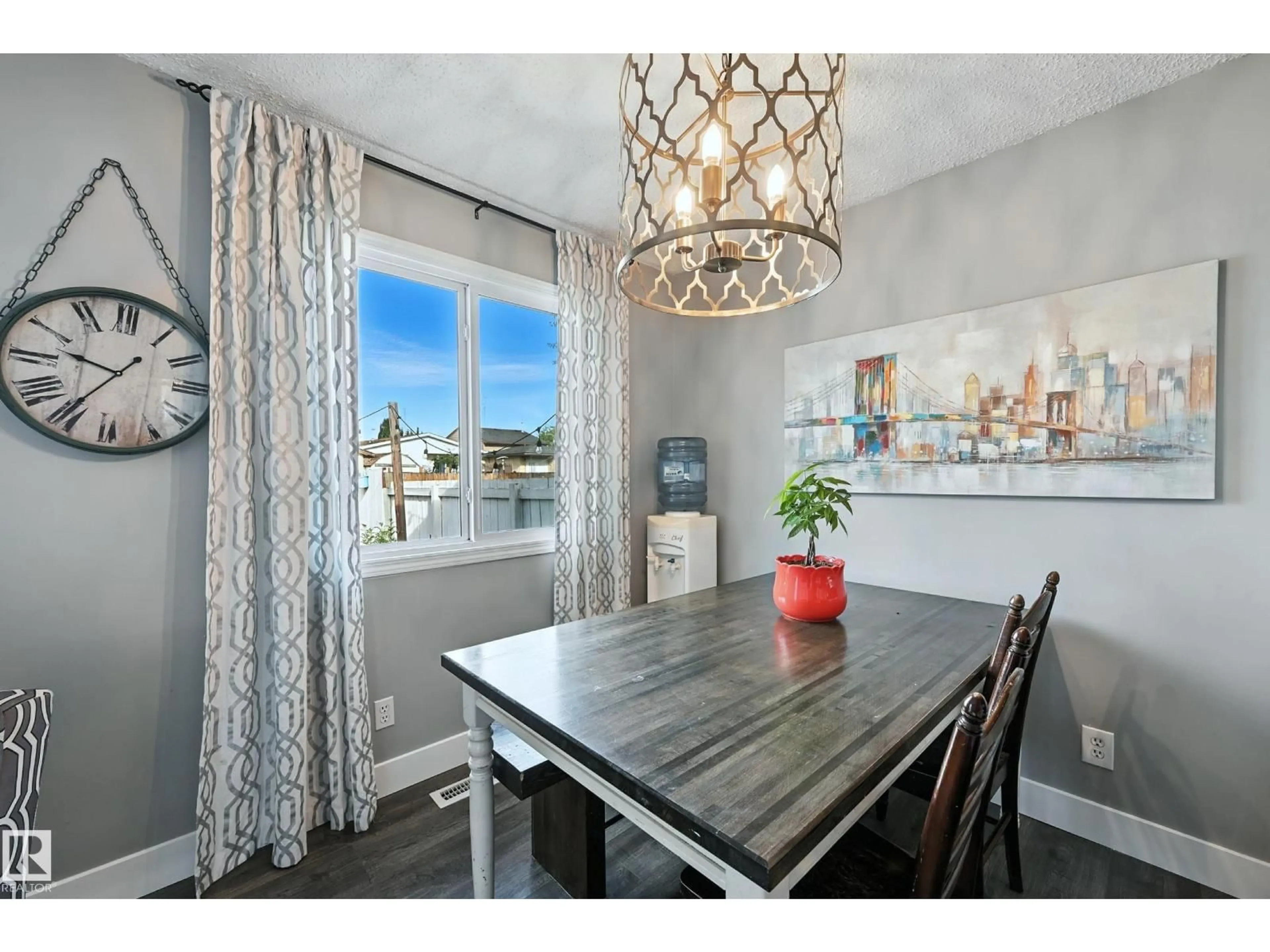 Dining room, wood/laminate floor for 57 PIPESTONE DR, Devon Alberta T9G1T4