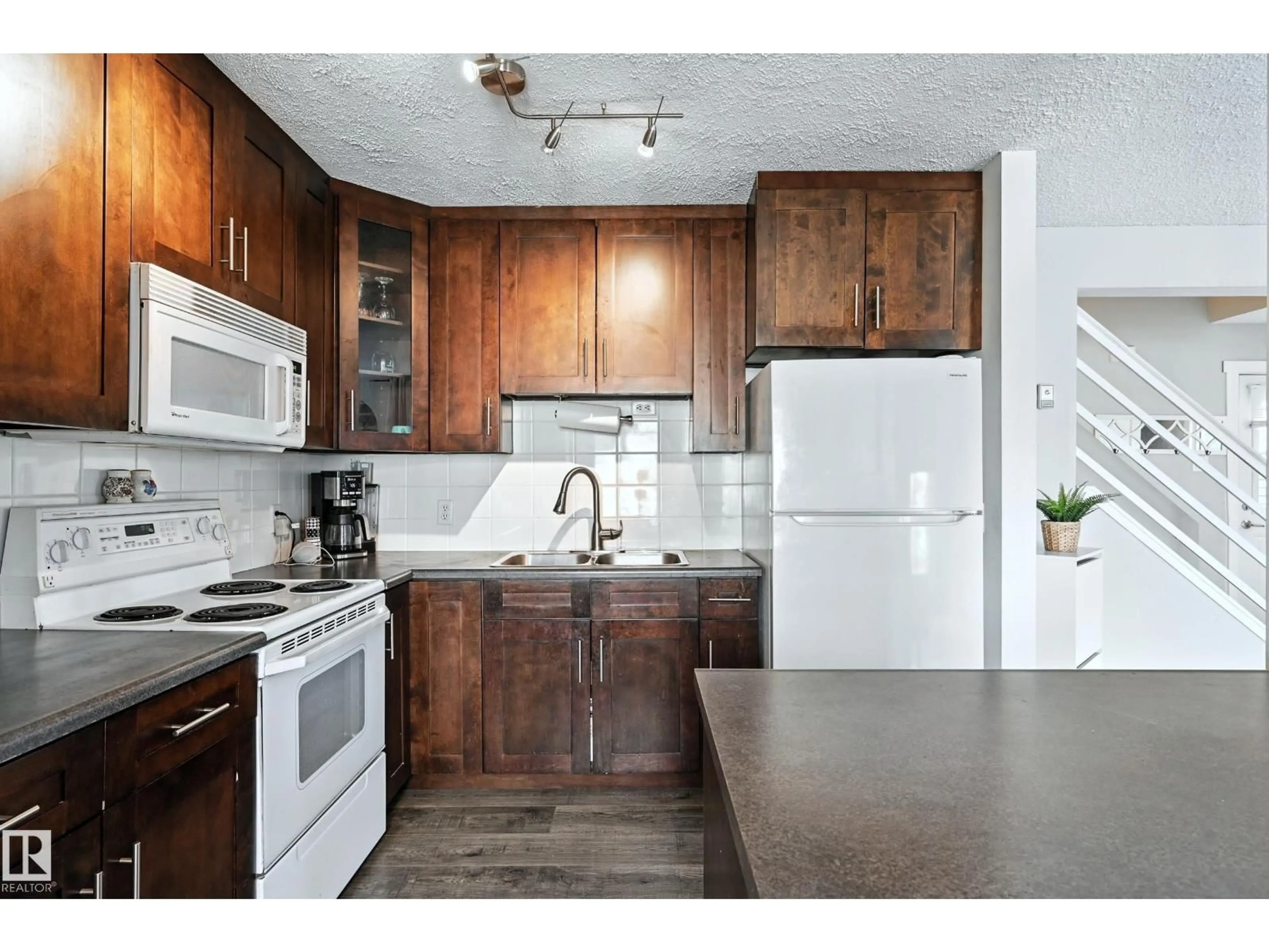Standard kitchen, unknown for 57 PIPESTONE DR, Devon Alberta T9G1T4