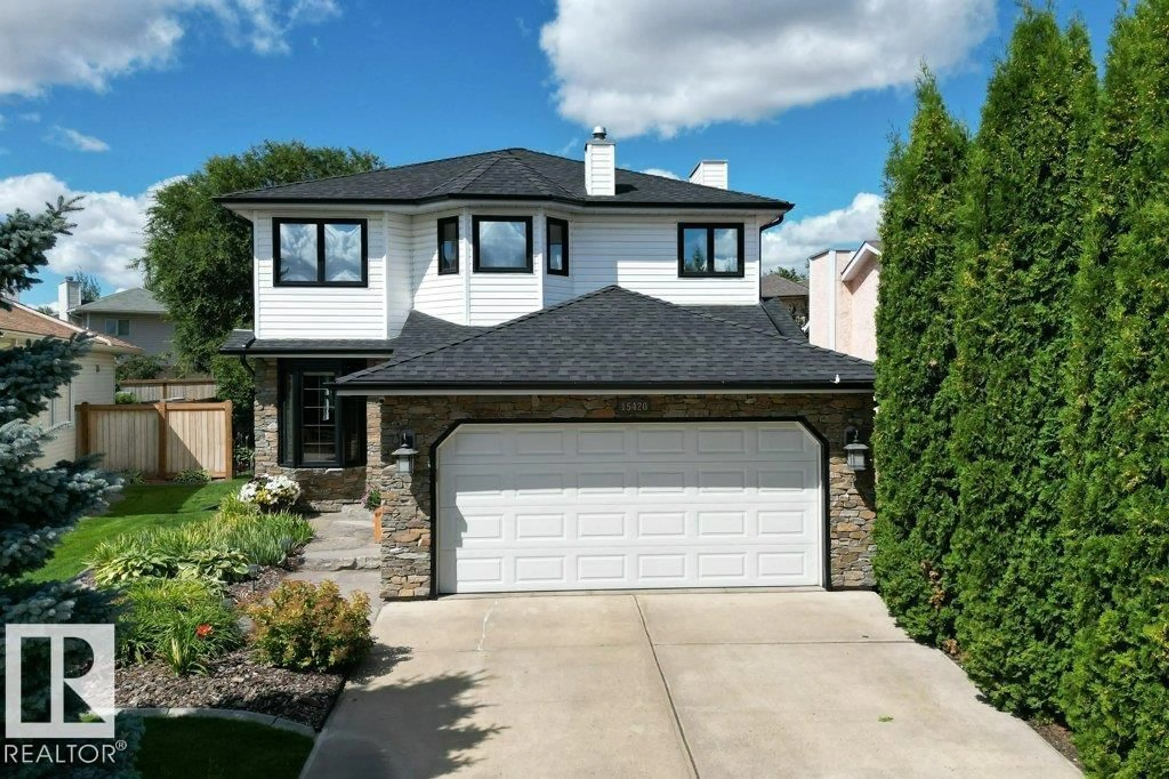 Home with vinyl exterior material, street for NW - 15420 64 ST, Edmonton Alberta T5Y2N4