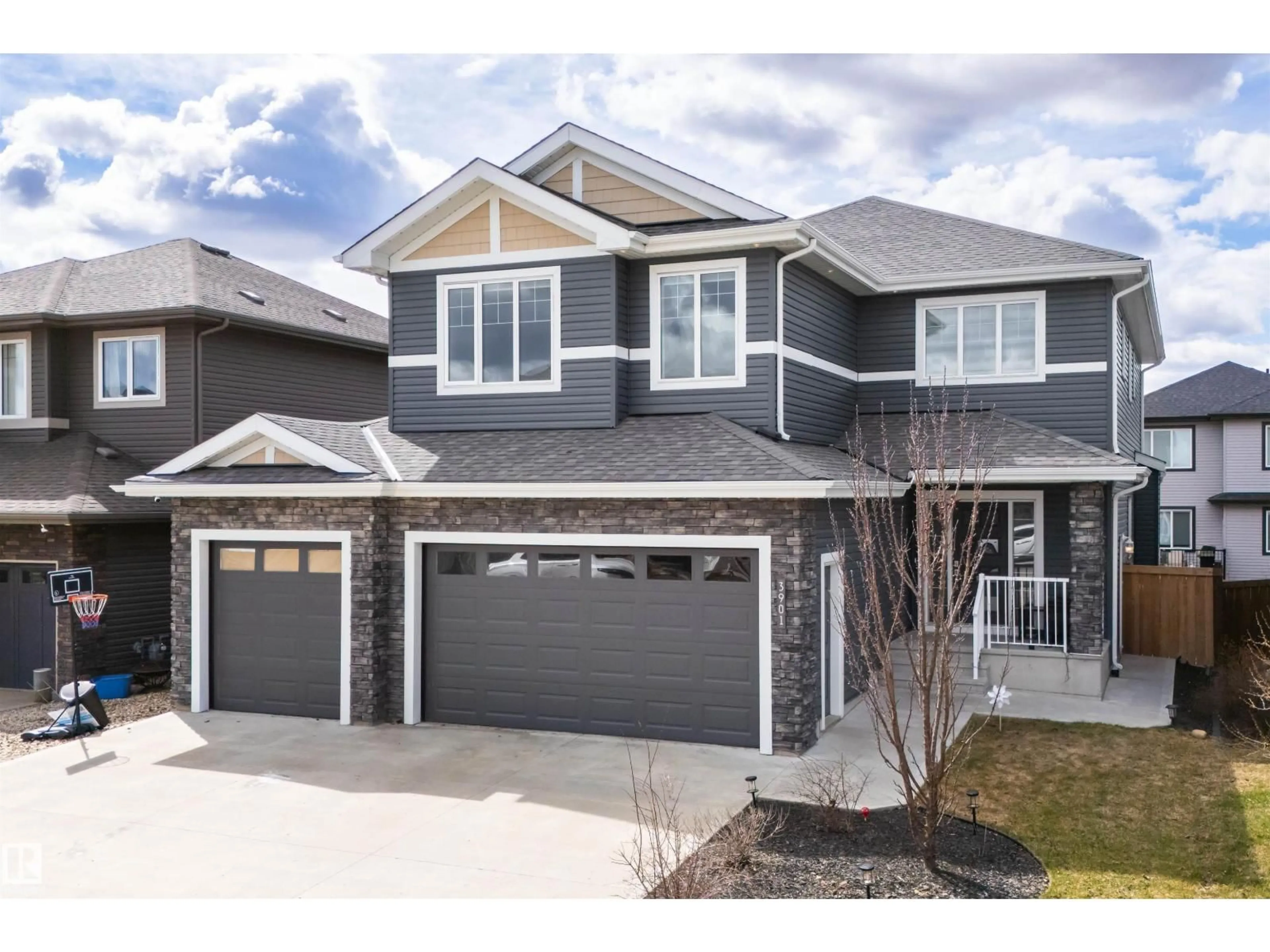 Home with vinyl exterior material, street for 3901 44 AV, Beaumont Alberta T4X2B7