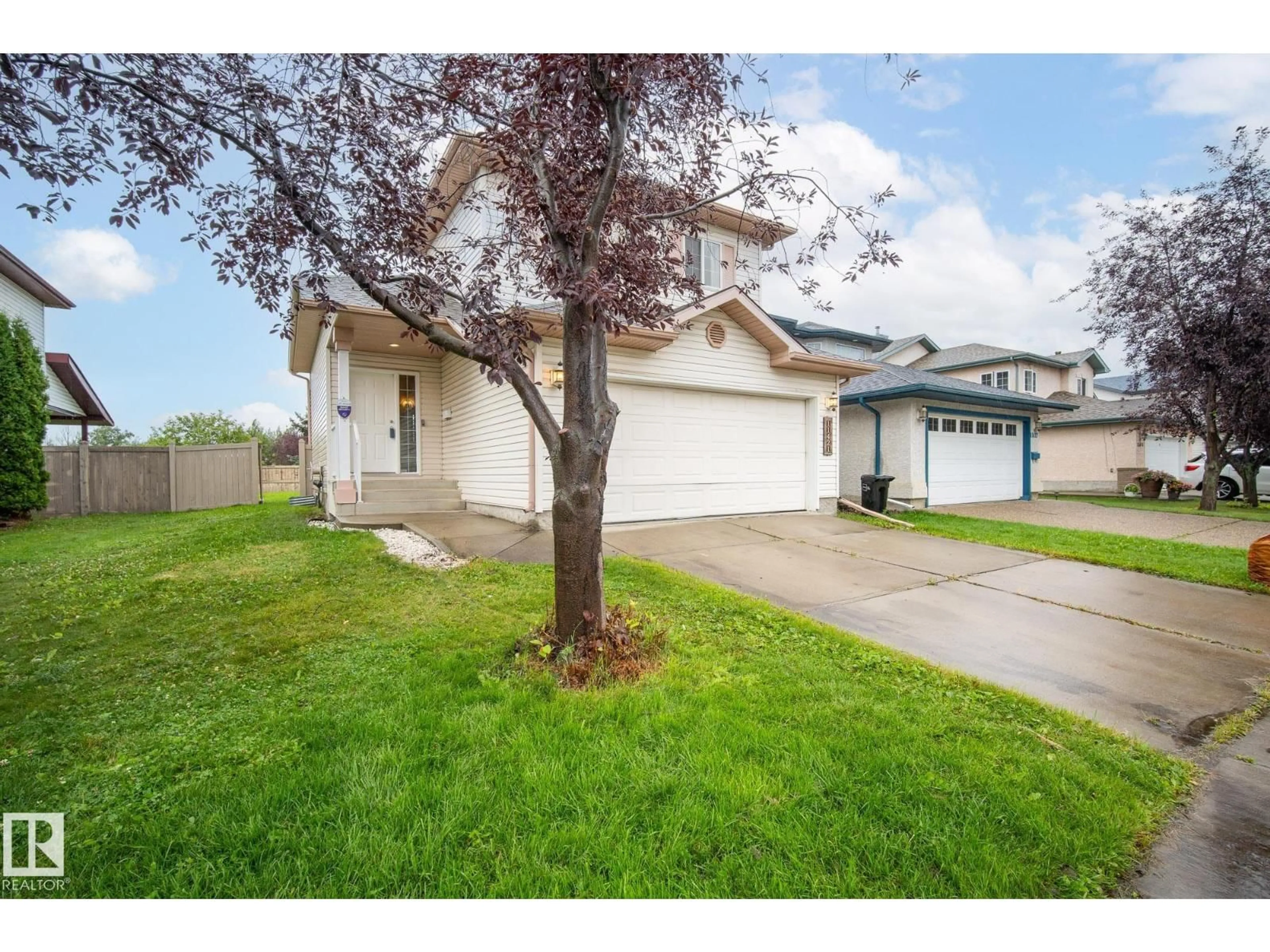 Home with vinyl exterior material, street for NW - 11421 118 ST, Edmonton Alberta T5G3J3