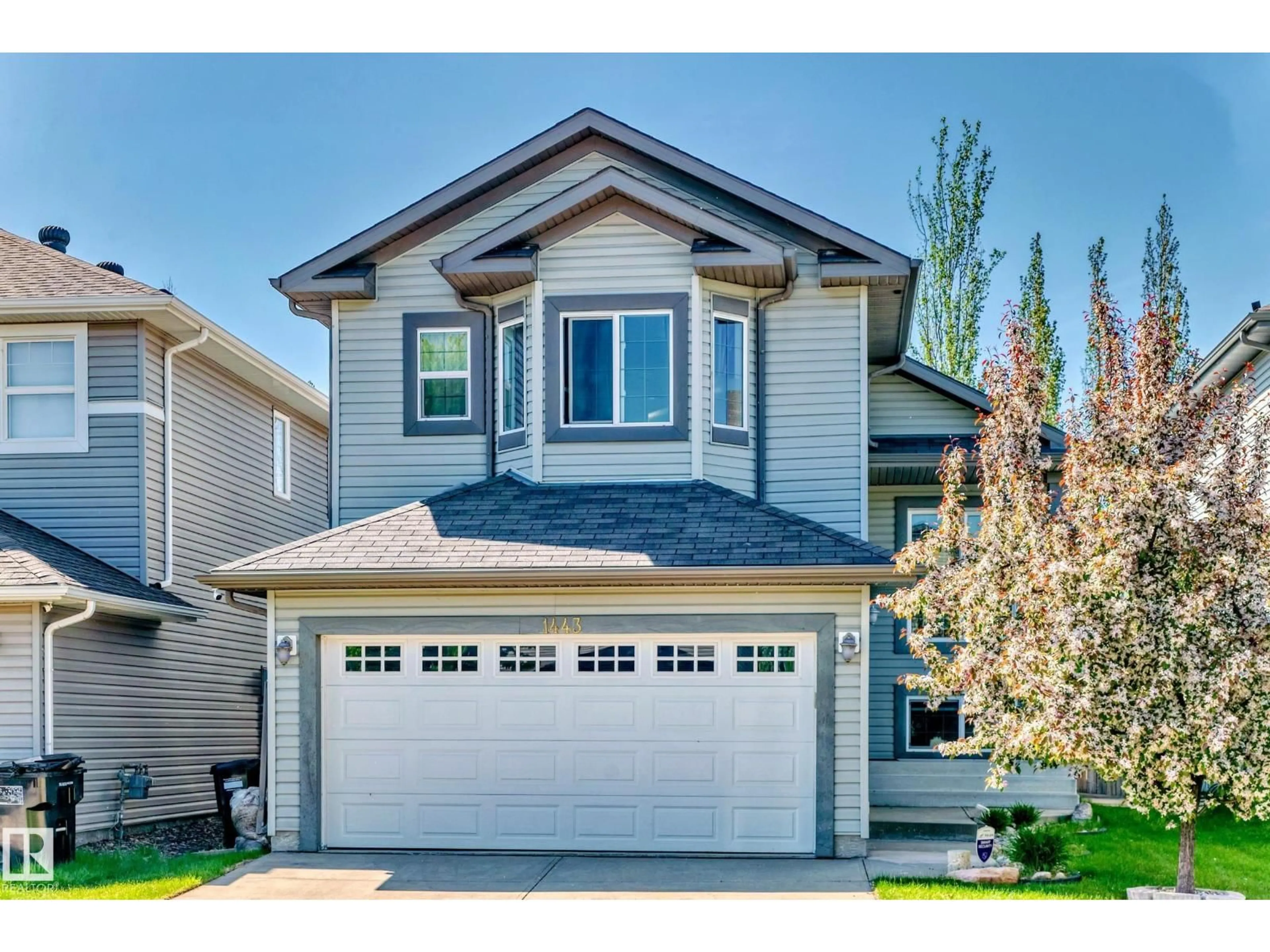 Home with vinyl exterior material, street for 1443 37C AV AV, Edmonton Alberta T6T0H8