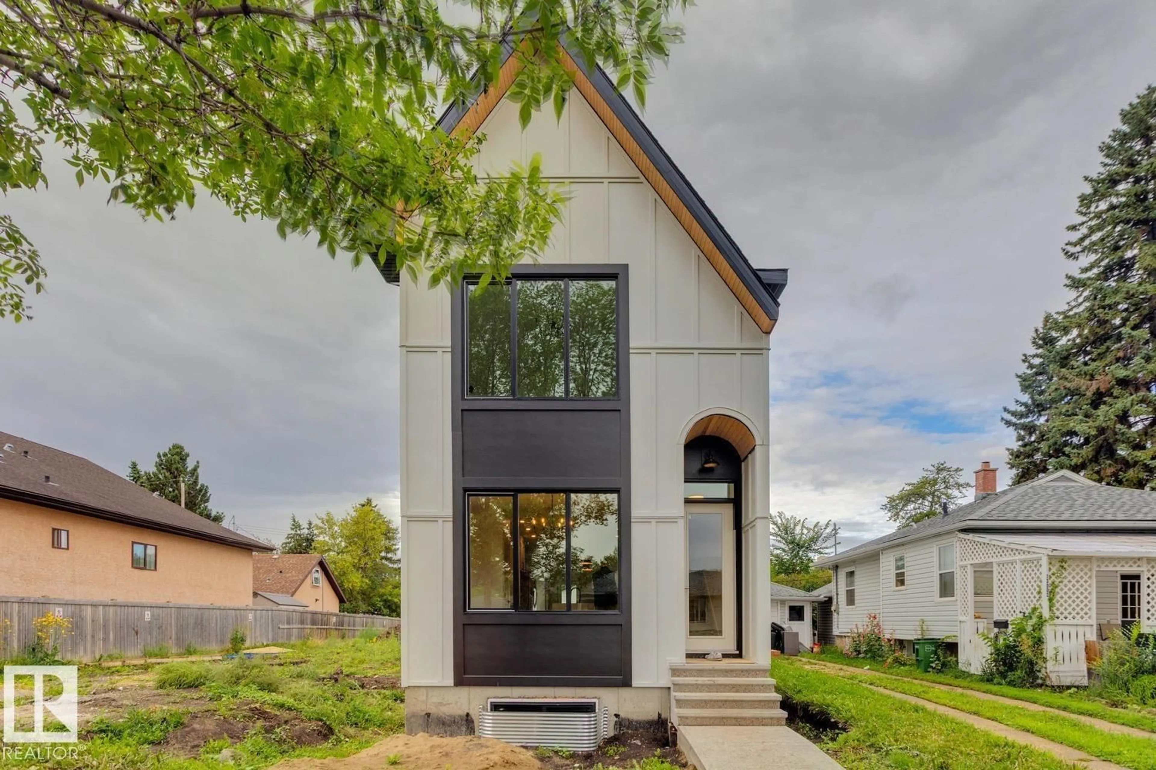 Home with brick exterior material, street for 11336 130 ST, Edmonton Alberta T5M1A2