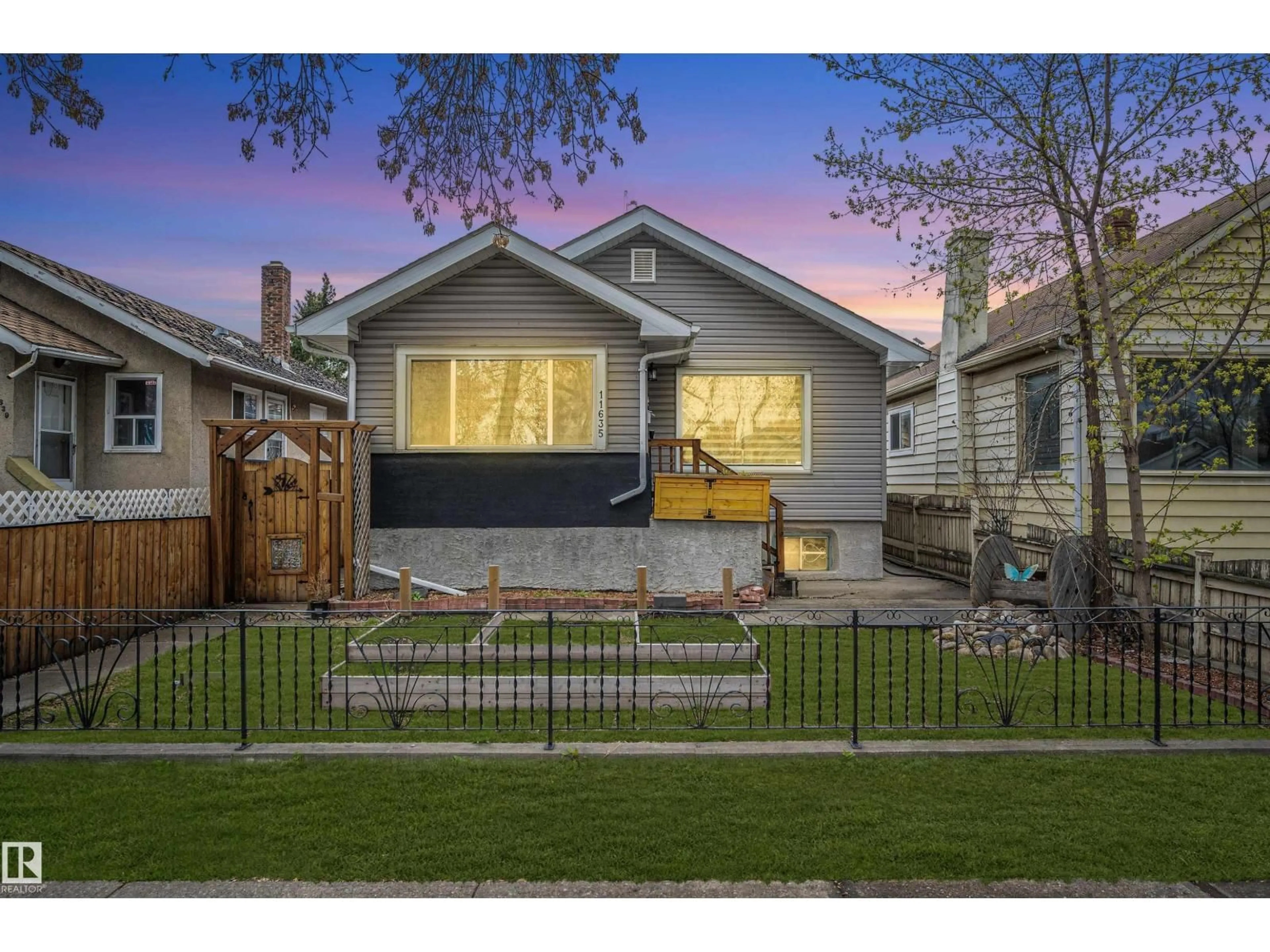 Home with vinyl exterior material, street for NW - 11635 97 ST, Edmonton Alberta T5G1Y1