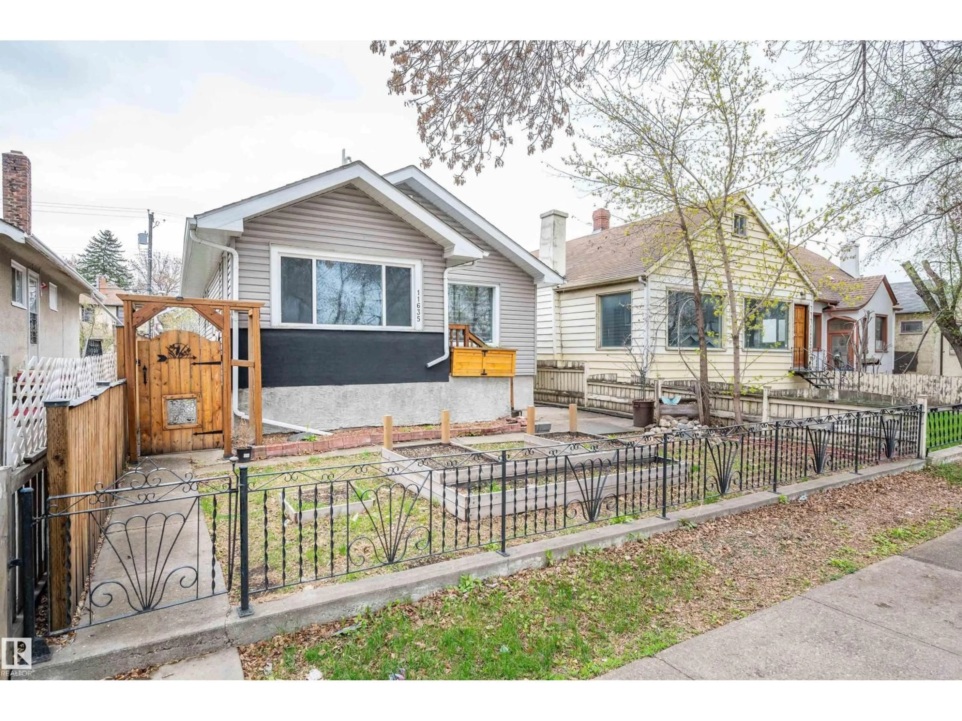 Home with brick exterior material, street for NW - 11635 97 ST, Edmonton Alberta T5G1Y1