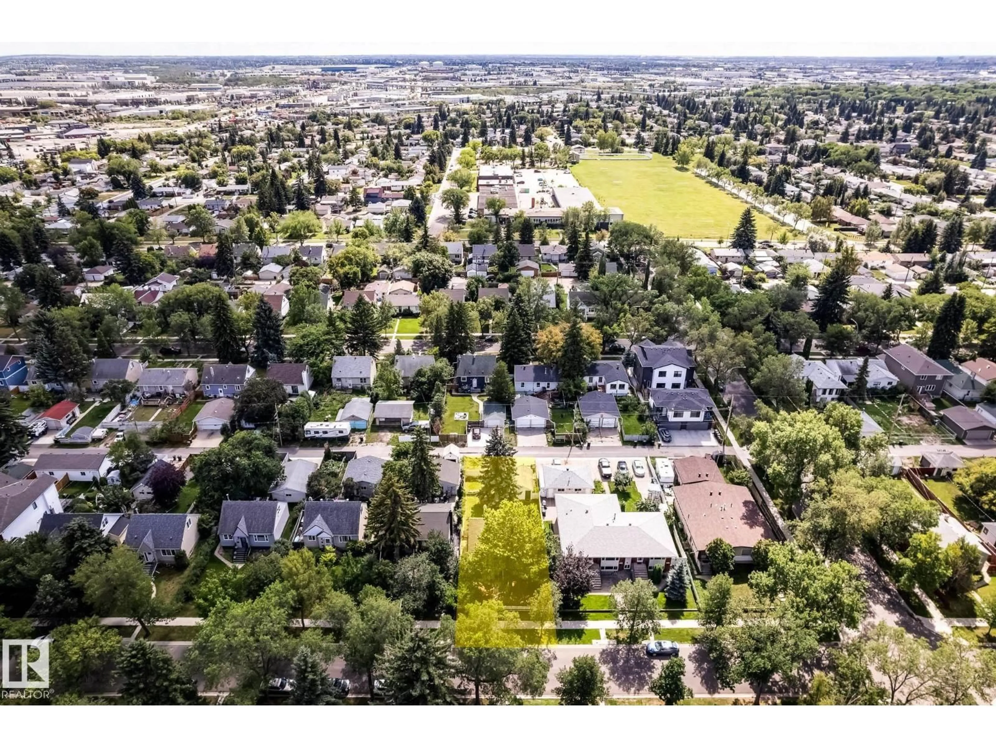 A pic from outside/outdoor area/front of a property/back of a property/a pic from drone, street for 7739 78 AV, Edmonton Alberta T6C0M8