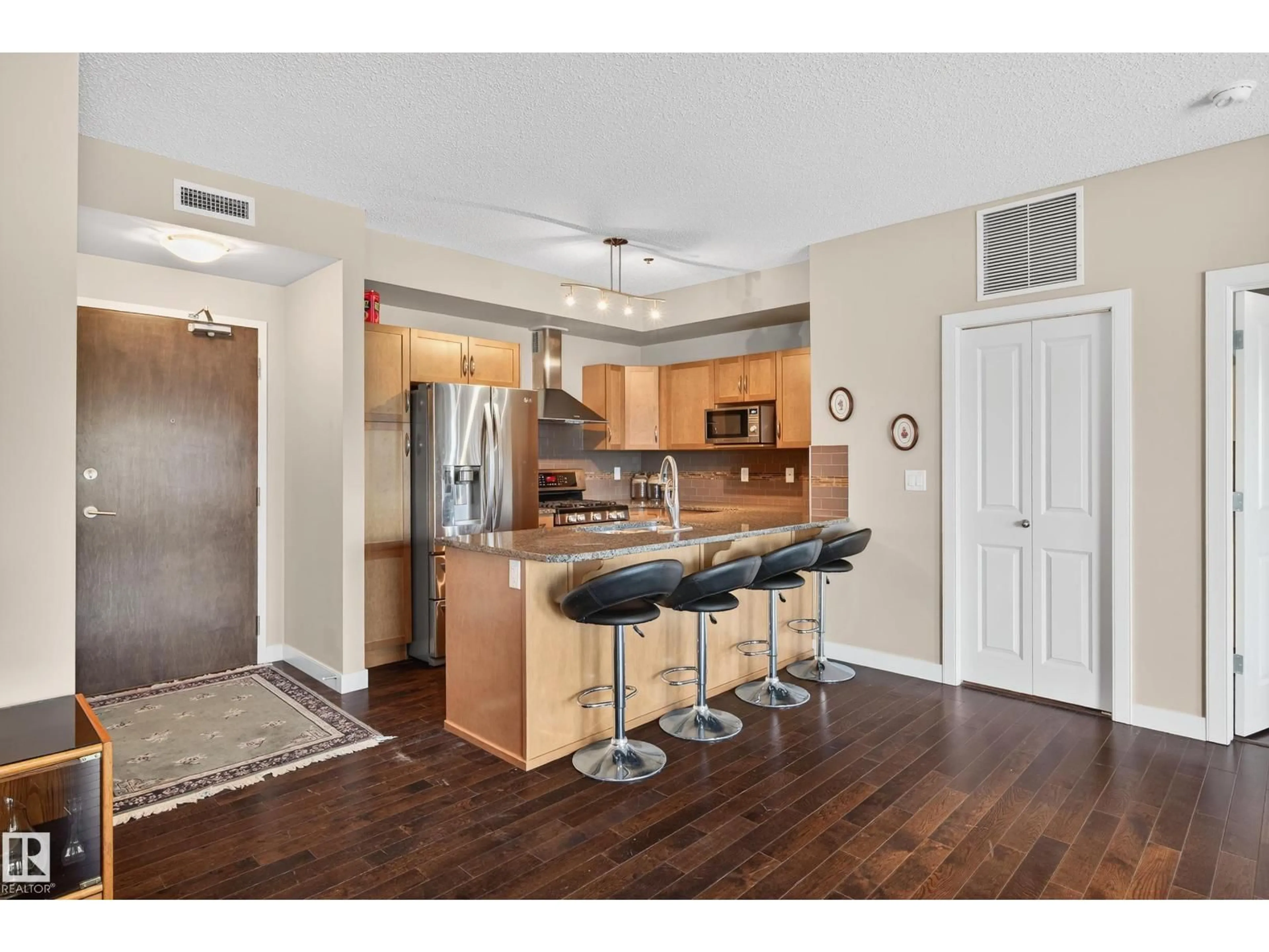 Open concept kitchen, wood/laminate floor for #3 - 35 STURGEON RD, St. Albert Alberta T8N0E8