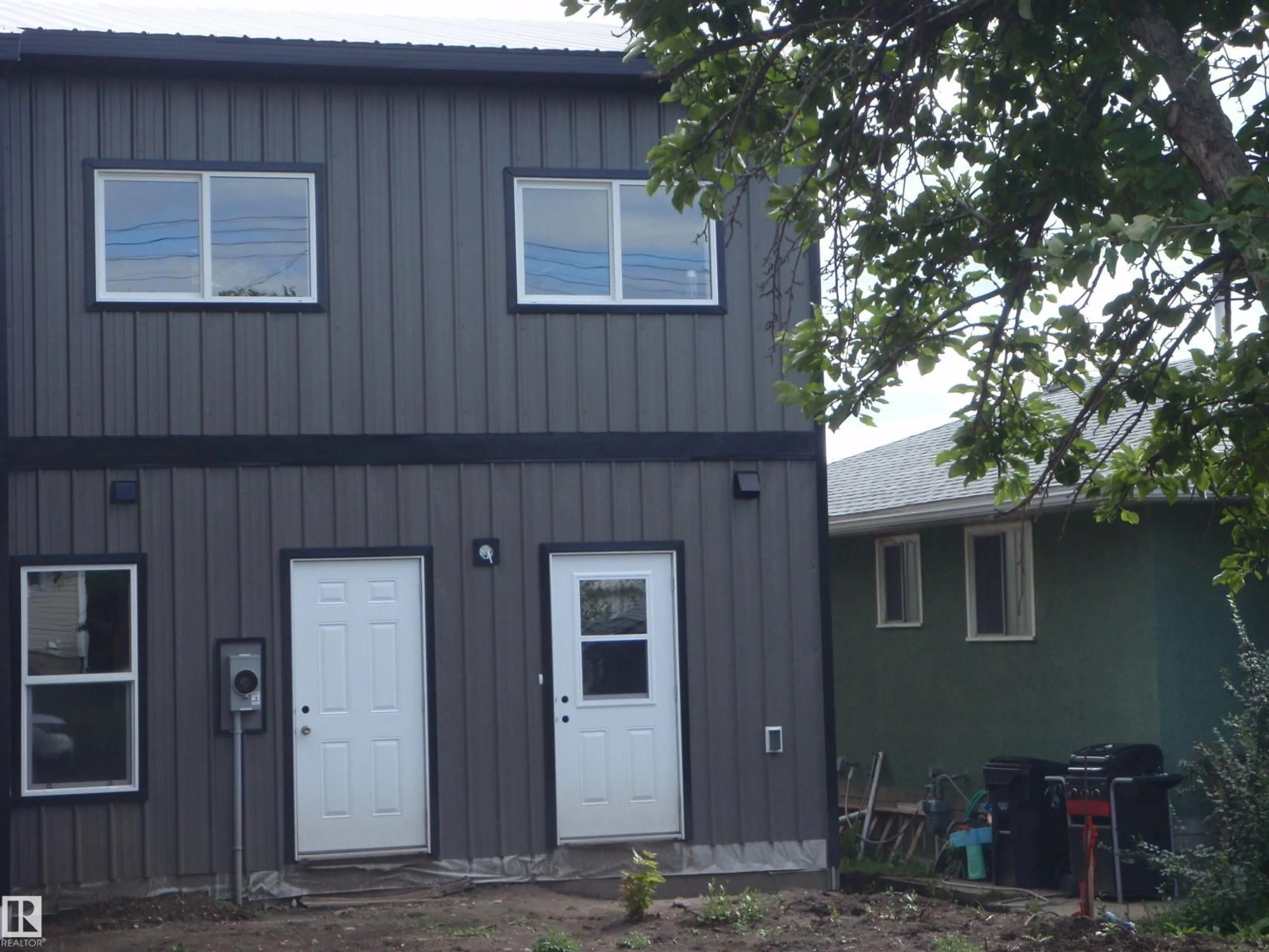 Home with vinyl exterior material, building for 4418 55 AV, Barrhead Alberta T7N1K1
