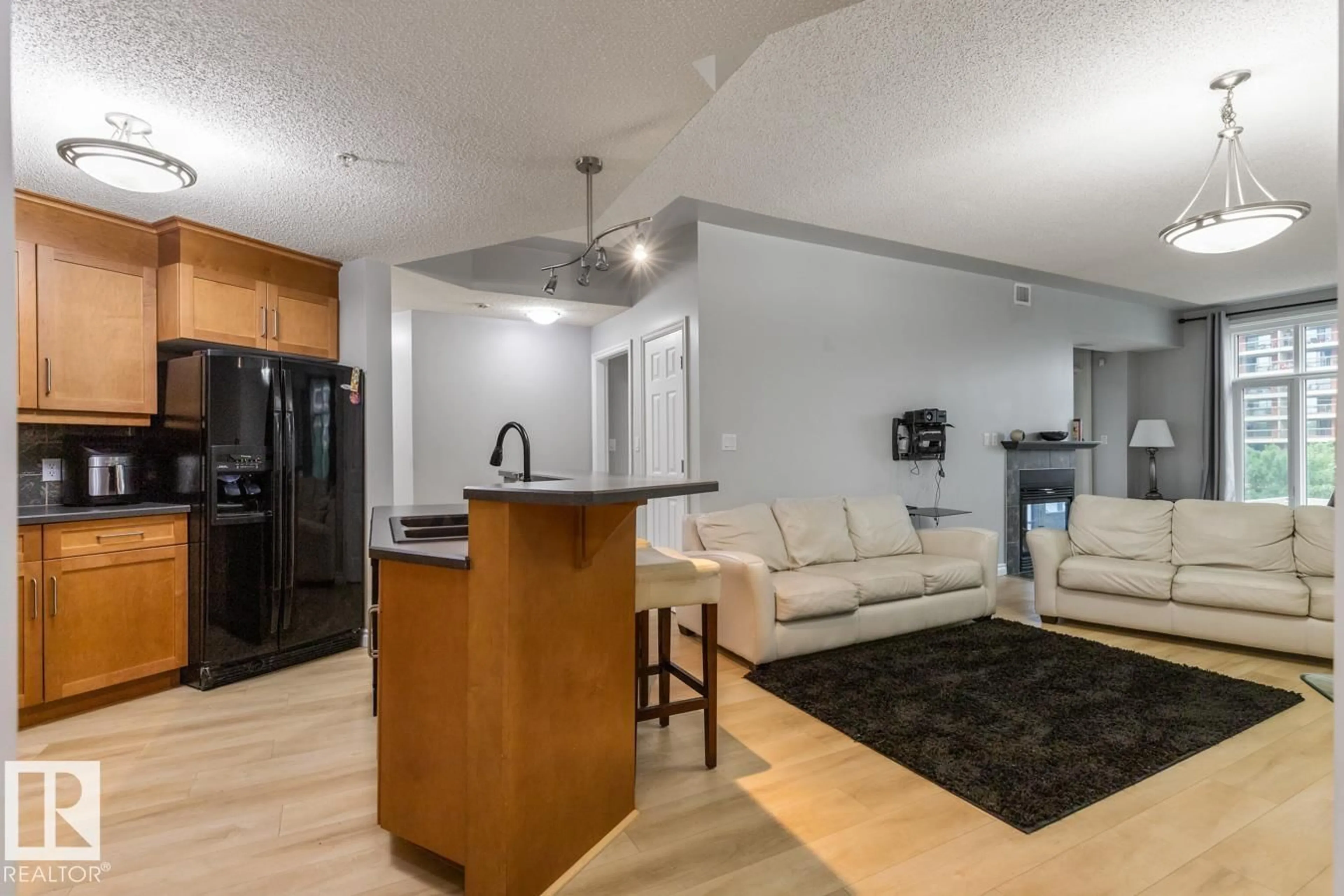 Open concept kitchen, unknown for #402 - 9020 JASPER AV, Edmonton Alberta T5H3S8