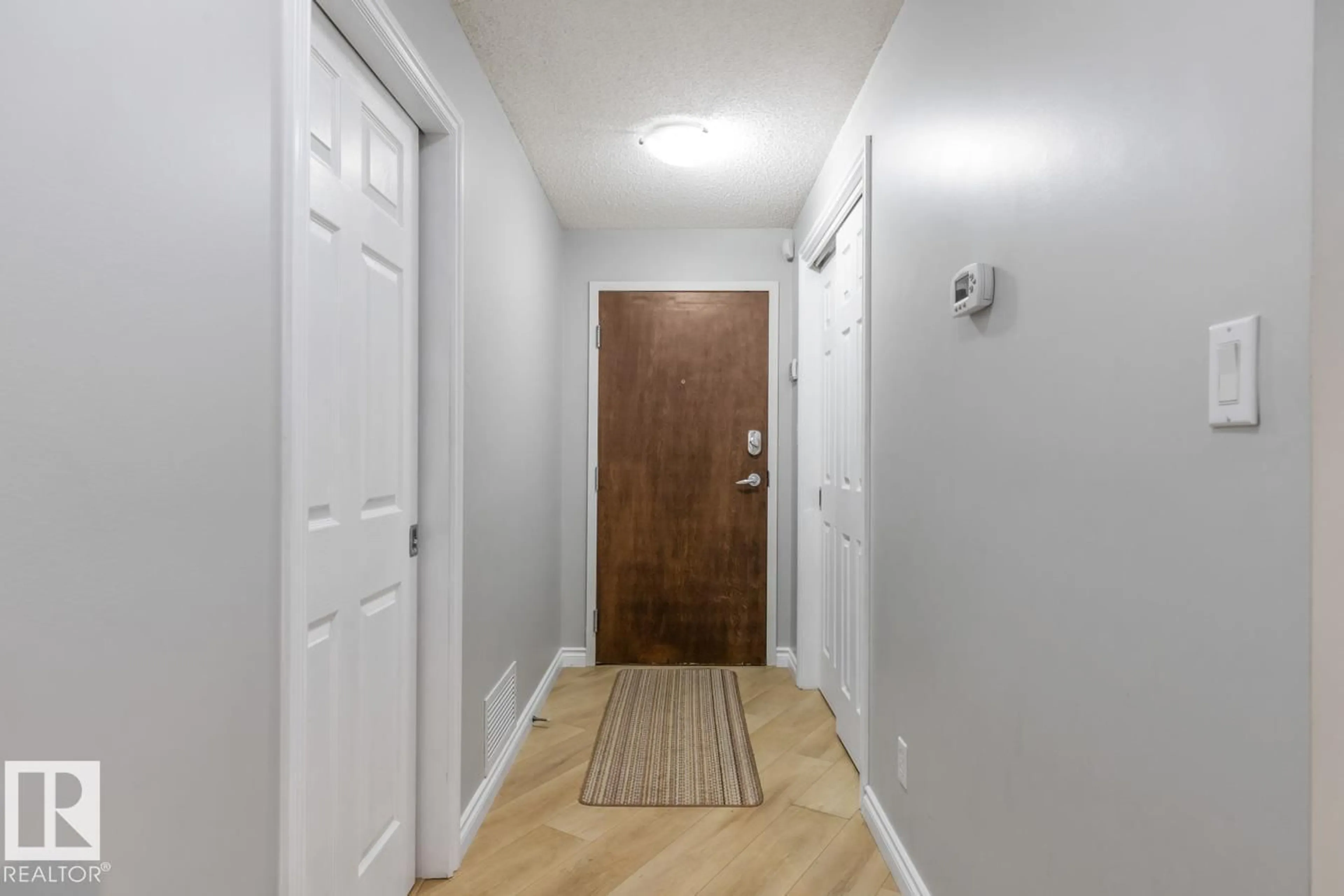 Indoor entryway for #402 - 9020 JASPER AV, Edmonton Alberta T5H3S8